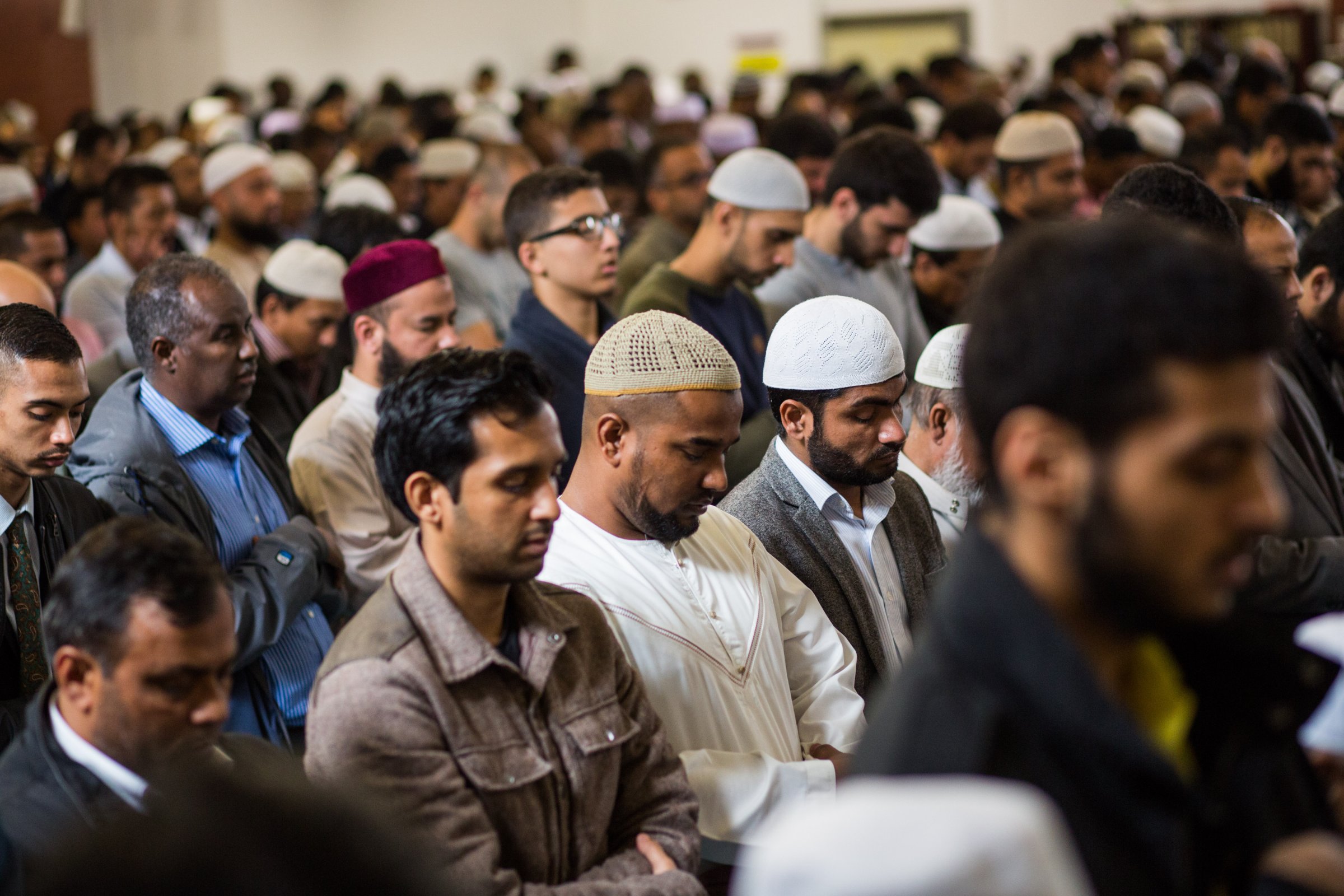 Men attend the first Friday prayers of the Islamic holy month of Ramadan at the East London Mosque on June 19, 2015 in London, England.