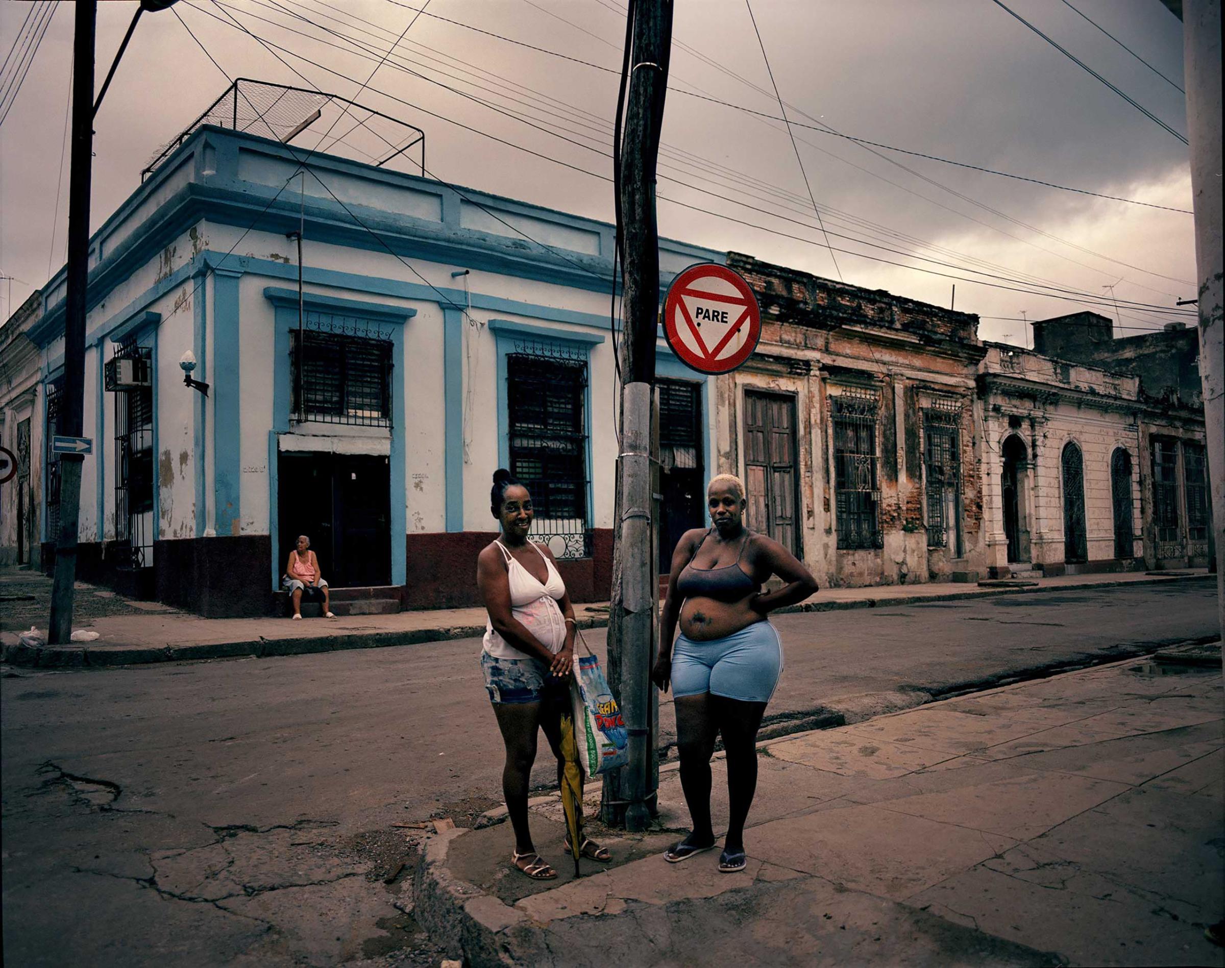 Women chatting in Cienfuegos, 270 kilometers east of Havana, Cuba.