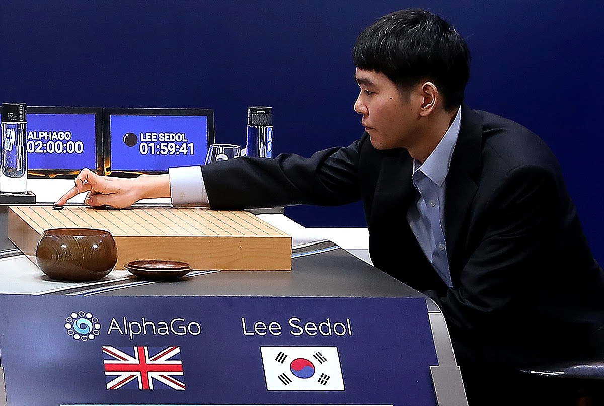 In this handout image provided by Google, South Korean professional Go player Lee Se-Dol (R) puts the first stone against Google's artificial intelligence program, AlphaGo, during the Google DeepMind Challenge Match on March 9, 2016 in Seoul, South Korea. (Google&mdash;Getty Images)