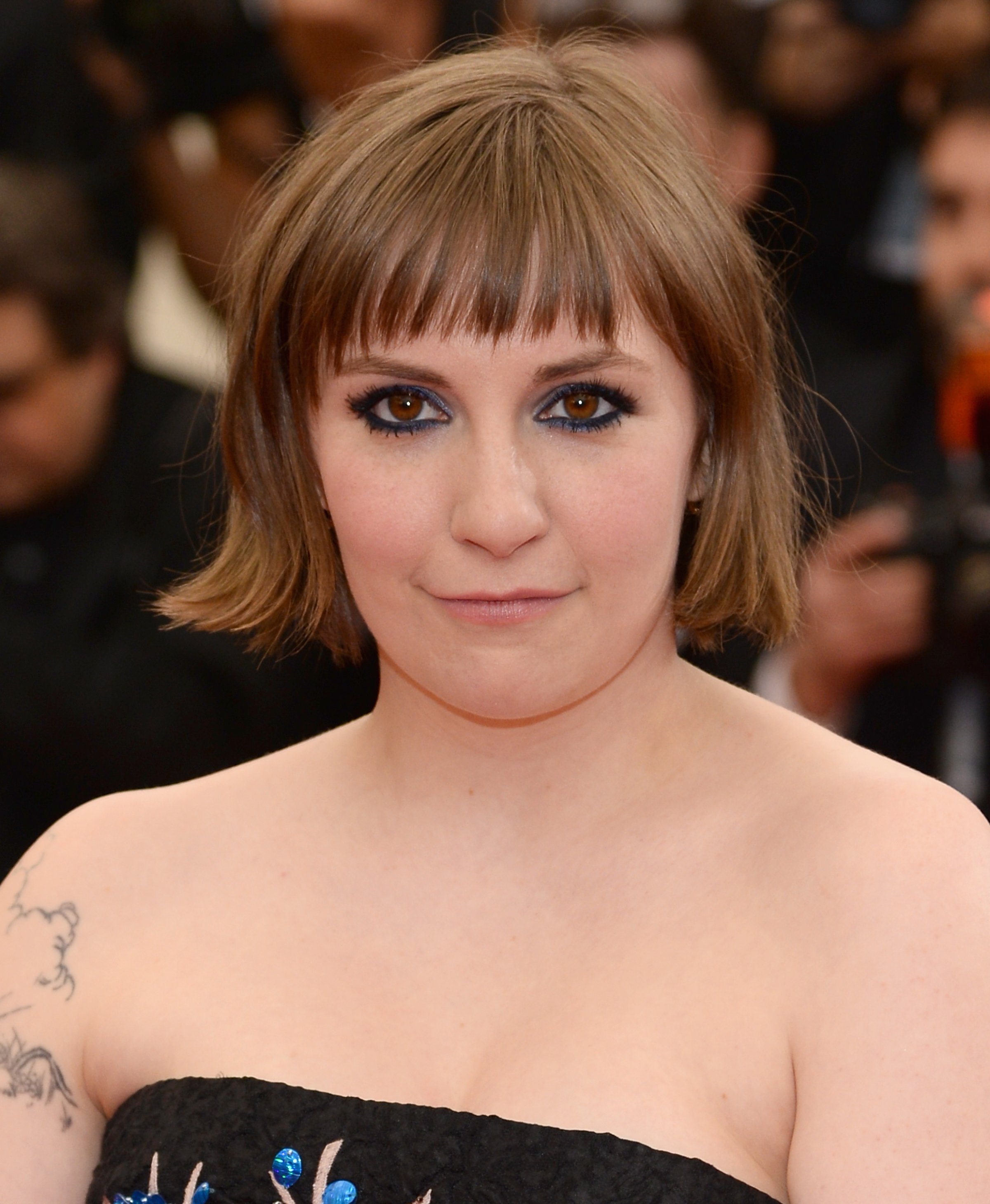 Lena Dunham attends the "Charles James: Beyond Fashion" Costume Institute Gala at the Metropolitan Museum of Art on May 5, 2014 in New York City.
