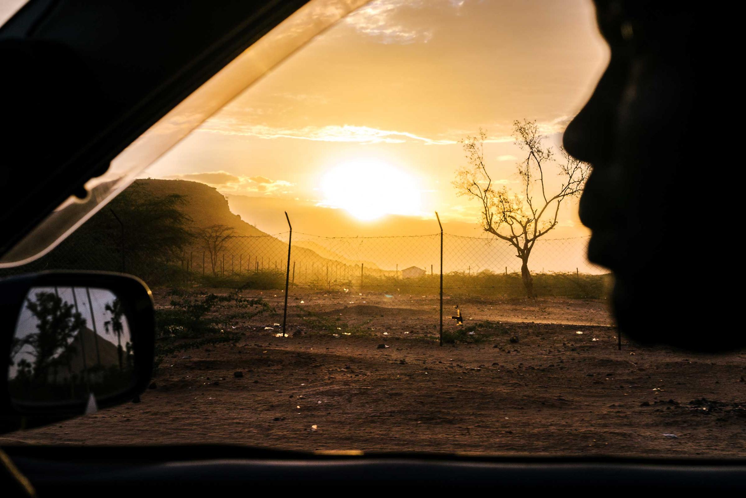 The sun sets over Lodwar in northwestern Kenya near where the Kakuma Refugee Camp is located. Kakuma is home to 182,000 refugees from all over the region, including many homophobic countries. Around 100 LGBT refugees from Uganda also call it home.