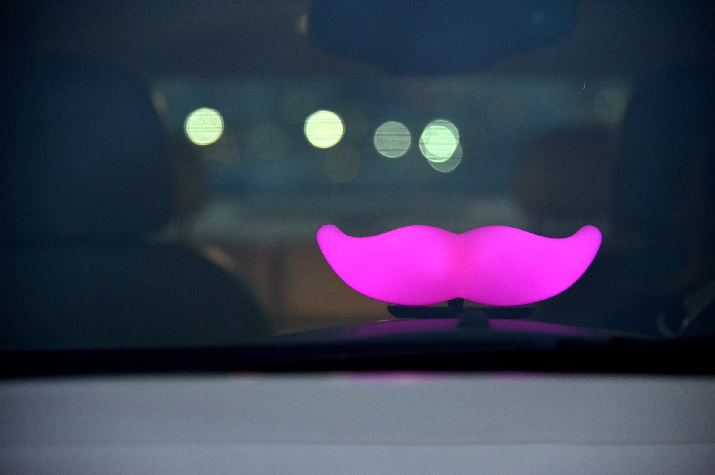 The Glowstache is seen in a Lyft driver's car in San Francisco, Calif. on Feb. 3, 2016.
