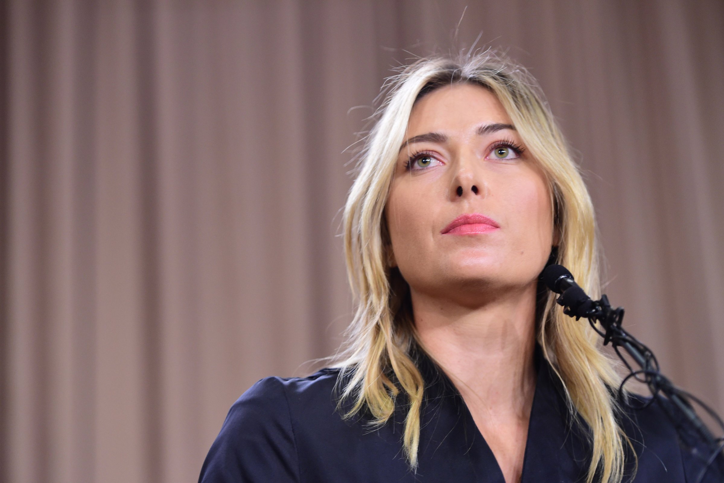 Russian tennis player Maria Sharapova speaks at a press conference in downtown Los Angeles, California, March 7, 2016. / AFP / Robyn Beck (Photo credit should read ROBYN BECK/AFP/Getty Images)