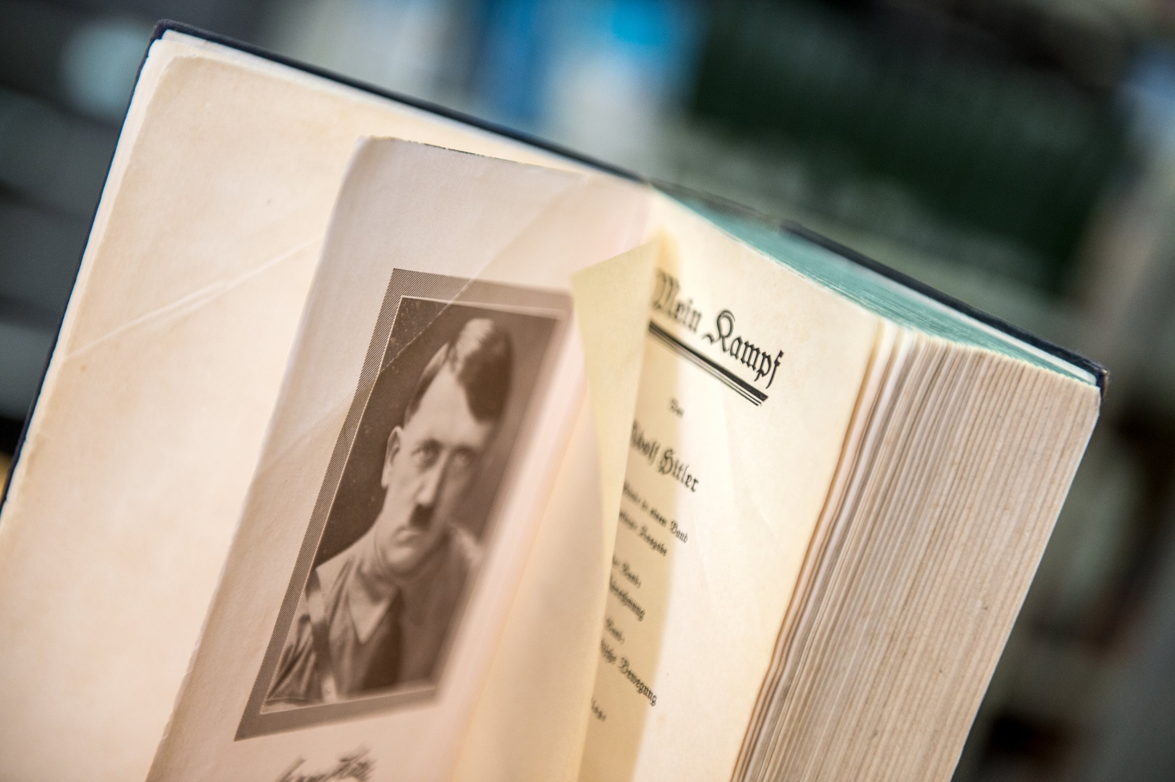 An opened page of the original edition of Hitler's inflammatory pamphlet 'Mein Kampf' shows a portrait of national socialist dictator Adolf Hitler, in a bookshop in Frankfurt, Germany on Jan.7, 2016.