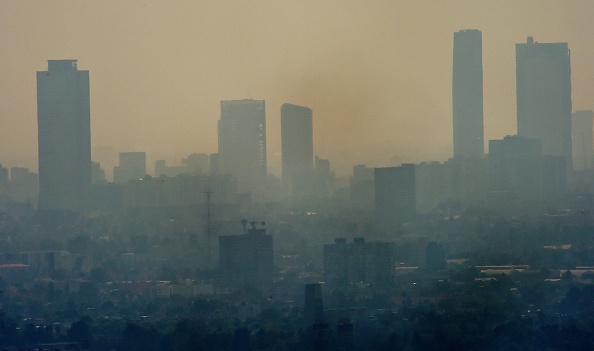View of Mexico City amid smog on Dec. 26, 2015. Mexico City is considered one of the most polluted cities in the world. (RONALDO SCHEMIDT—AFP/Getty Images)