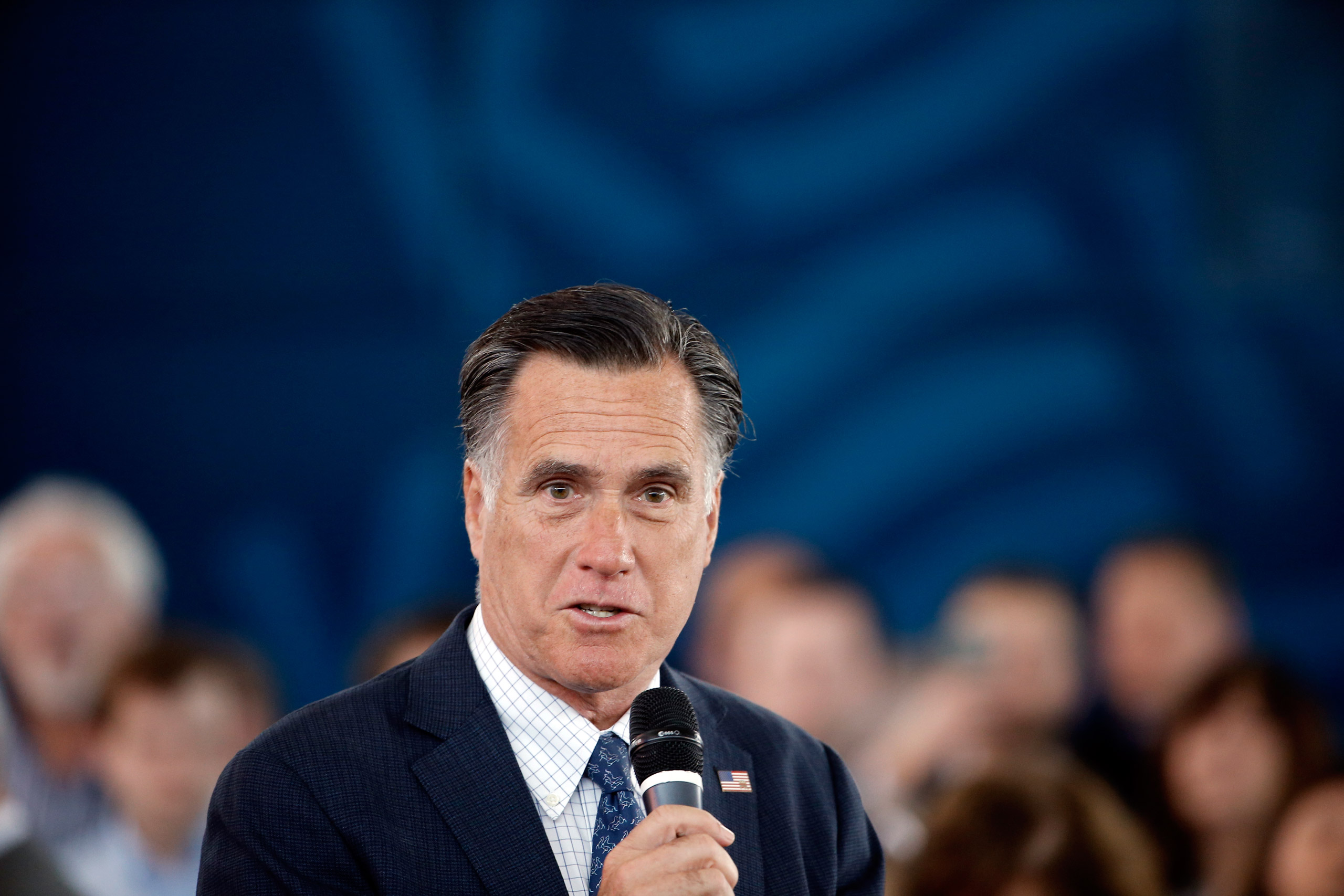 Former Republican presidential candidate Mitt Romney speaks during Republican presidential candidate, Ohio Gov. John Kasich campaign stop on Monday, March 14, 2016, at the MAPS Air Museum in North Canton, Ohio. (AP Photo/Matt Rourke)