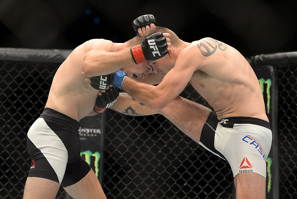 Johnny Case and Jake Matthews trade blows during their UFC Lightweight Bout at UFC Brisbane on March 20, 2016 in Brisbane, Australia. (Bradley Kanaris&mdash;Getty Images)