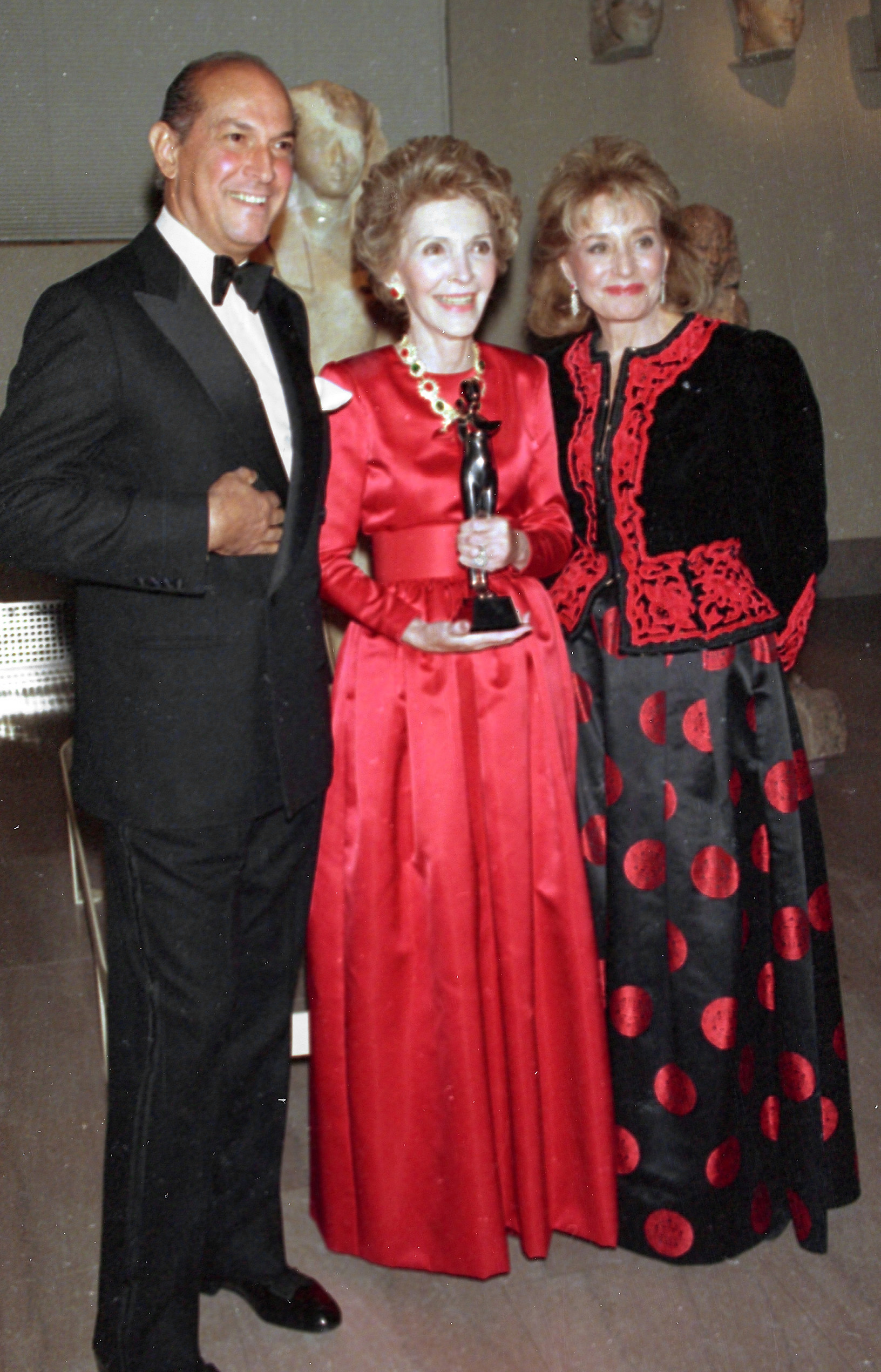 Oscar de la Renta and Barbara Walters posing with former first lady Nancy Reagan at the Metropolitan Museum of Art in New York, where the first lady was awarded the Council of Fashion Designers of America's Lifetime Achievement Award for her contributions to fashion on Jan. 10, 1989.