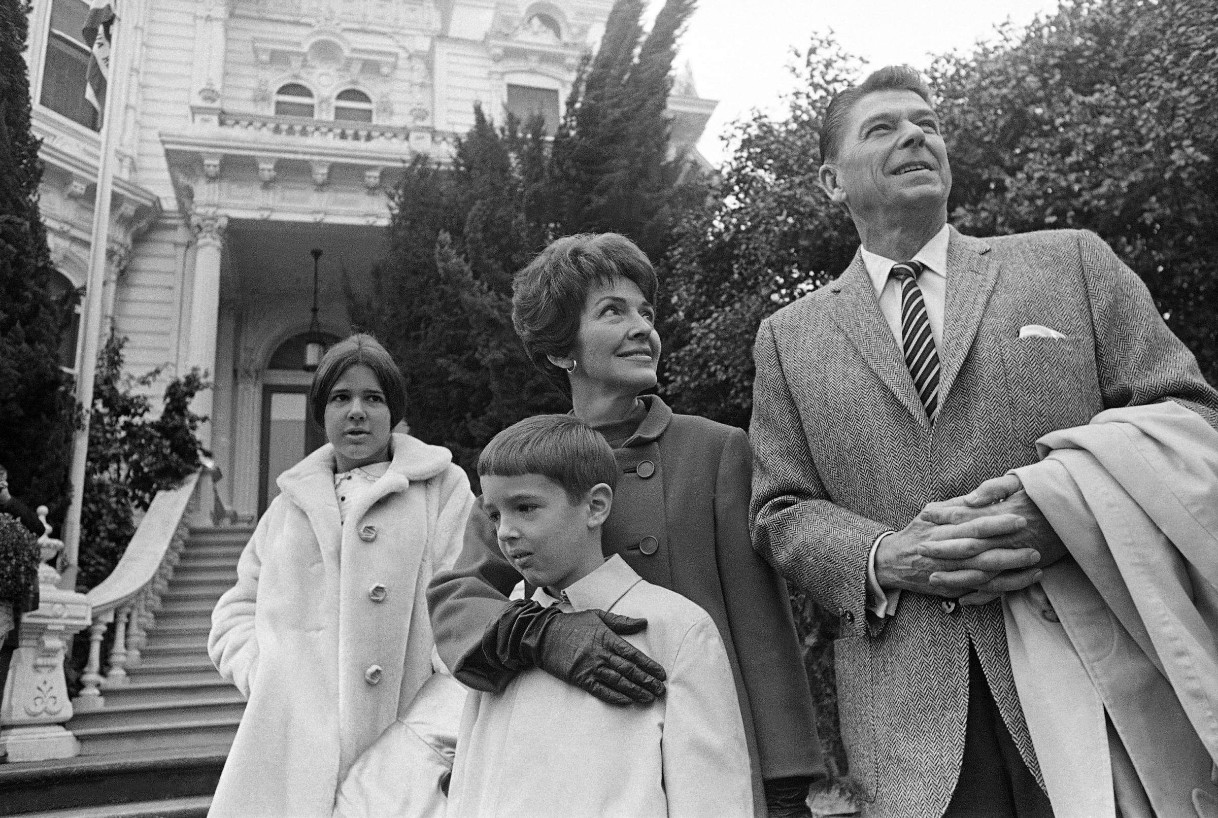 Then governor-elect of California Ronald Reagan is photographer with his wife, Nancy, and children Ronald Jr., 8, and Patricia, 13, outside the Executive Mansion in Sacramento, Calif., on Jan. 1, 1967.