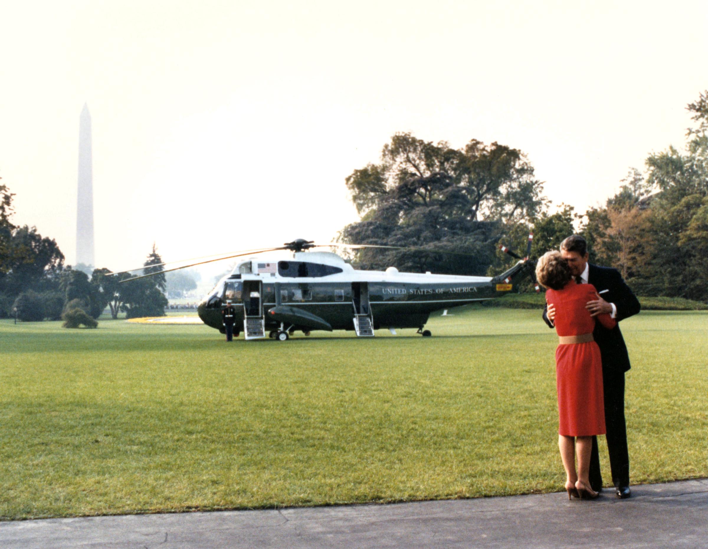 President Ronald Reagan kisses First Lady Nancy Reagan in Washington, in an undated photo.