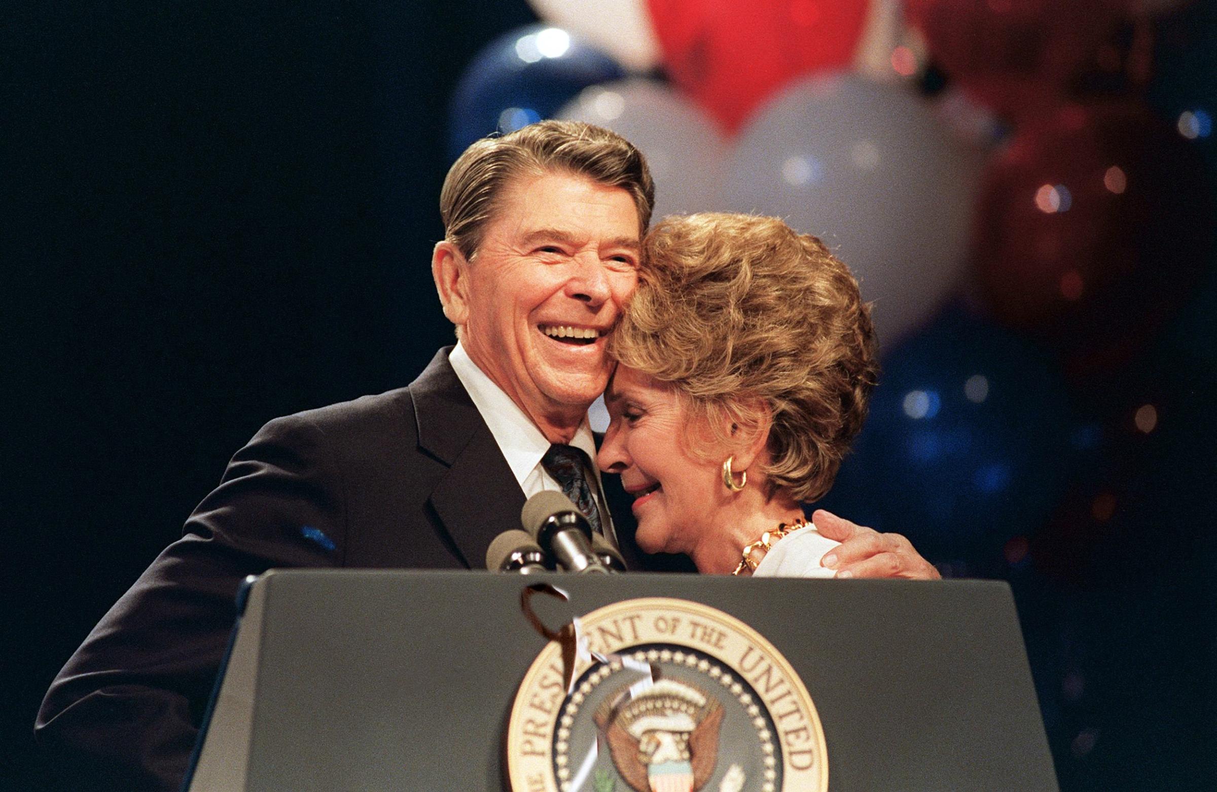First Lady Nancy Reagan and her husband President Ronald Reagan appear during a luncheon in New Orleans on Aug. 15, 1988.