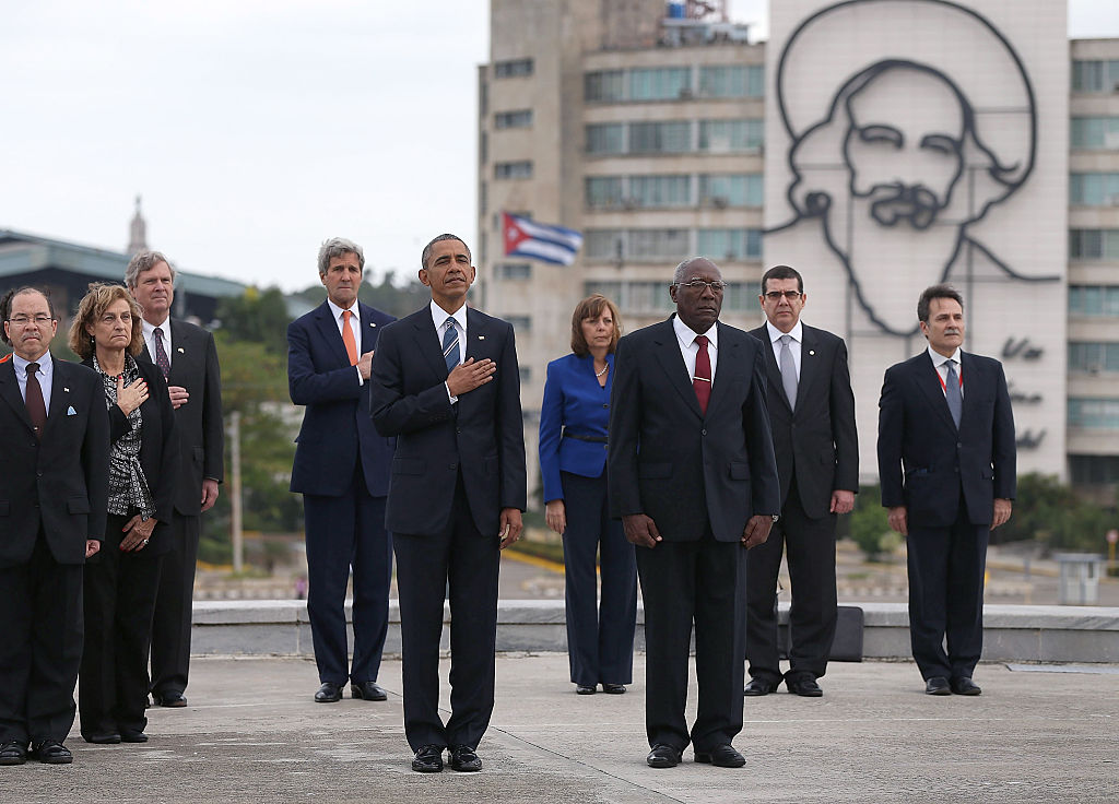President Barack Obama stands with Salvador Sanchez Mesa,  Vice President of the Council of Ministry, as they take part in a wreath laying ceremony at the Jose Marti memorial in Revolution Square on March 21, 2016 in Havana, Cuba. (Joe Raedle&mdash;Getty Images)