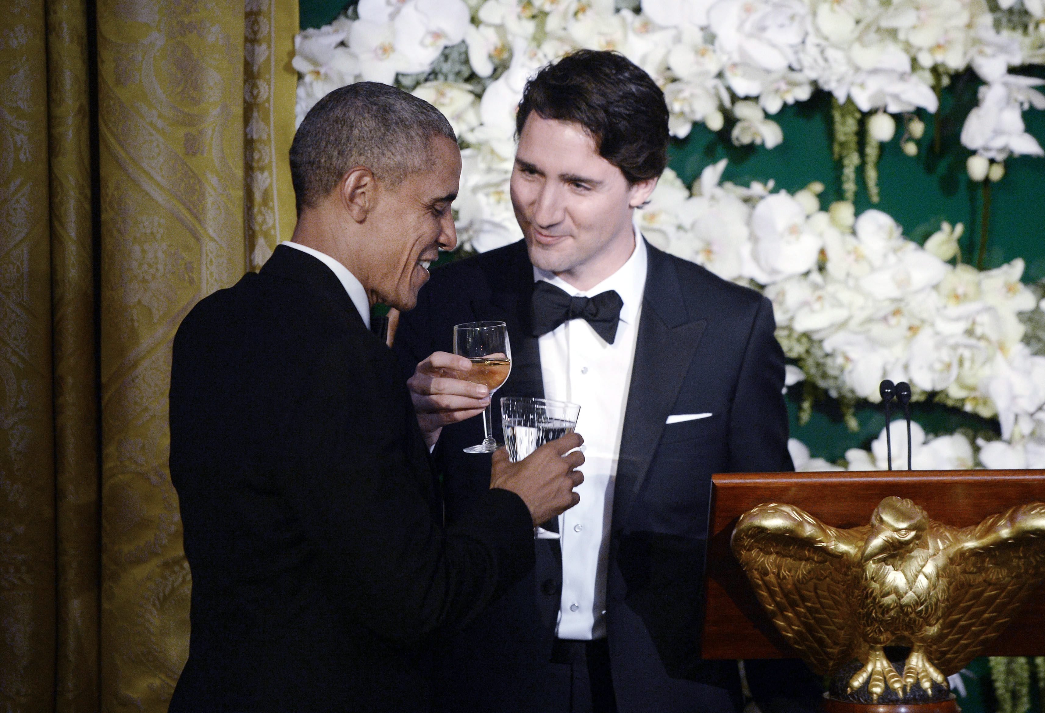 President Barack Obama, left, and  Canadian Prime Minister Trudeau exchange toasts during a state dinner at the White House, in Washington, DC, March 10, 2016. (Olivier Douliery—Pool/EPA)