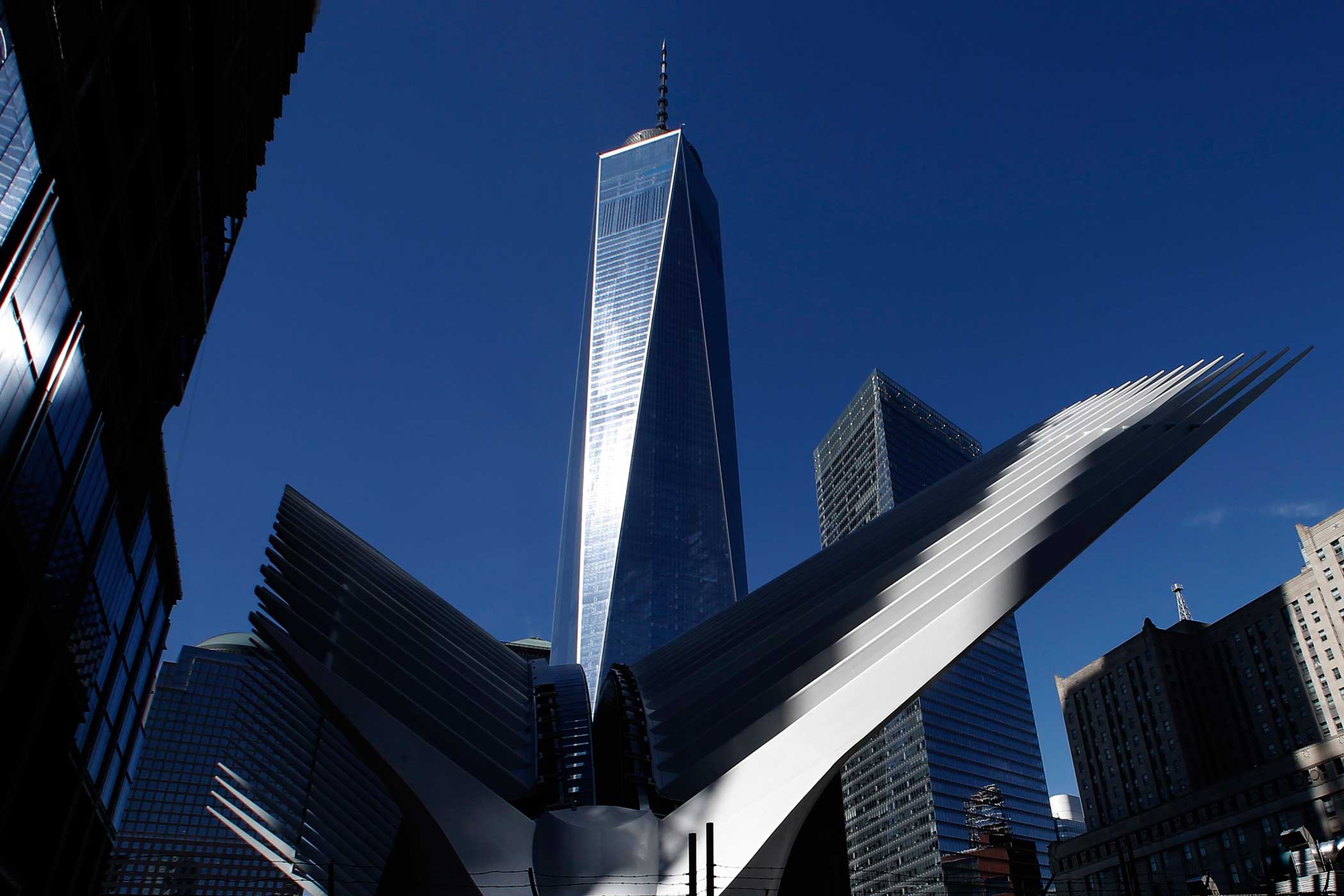 Part of the Oculus structure of the World Trade Center Transportation Hub is pictured next to the One World Trade Center tower in the Manhattan borough of New York