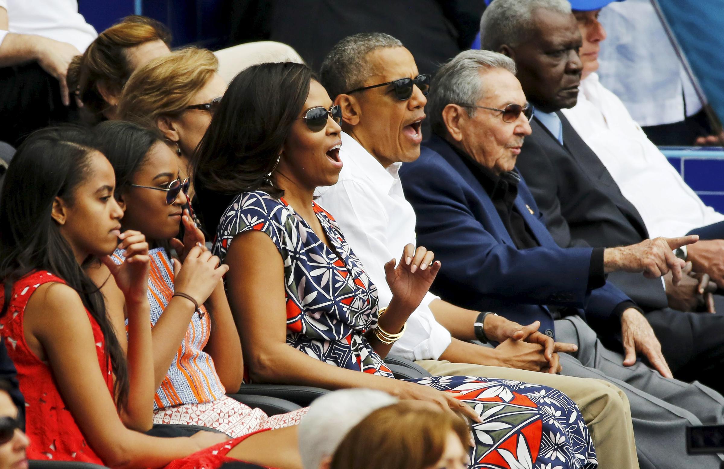 President Obama and his family watch a baseball game with Cuban President Castro in Havana on March 22.