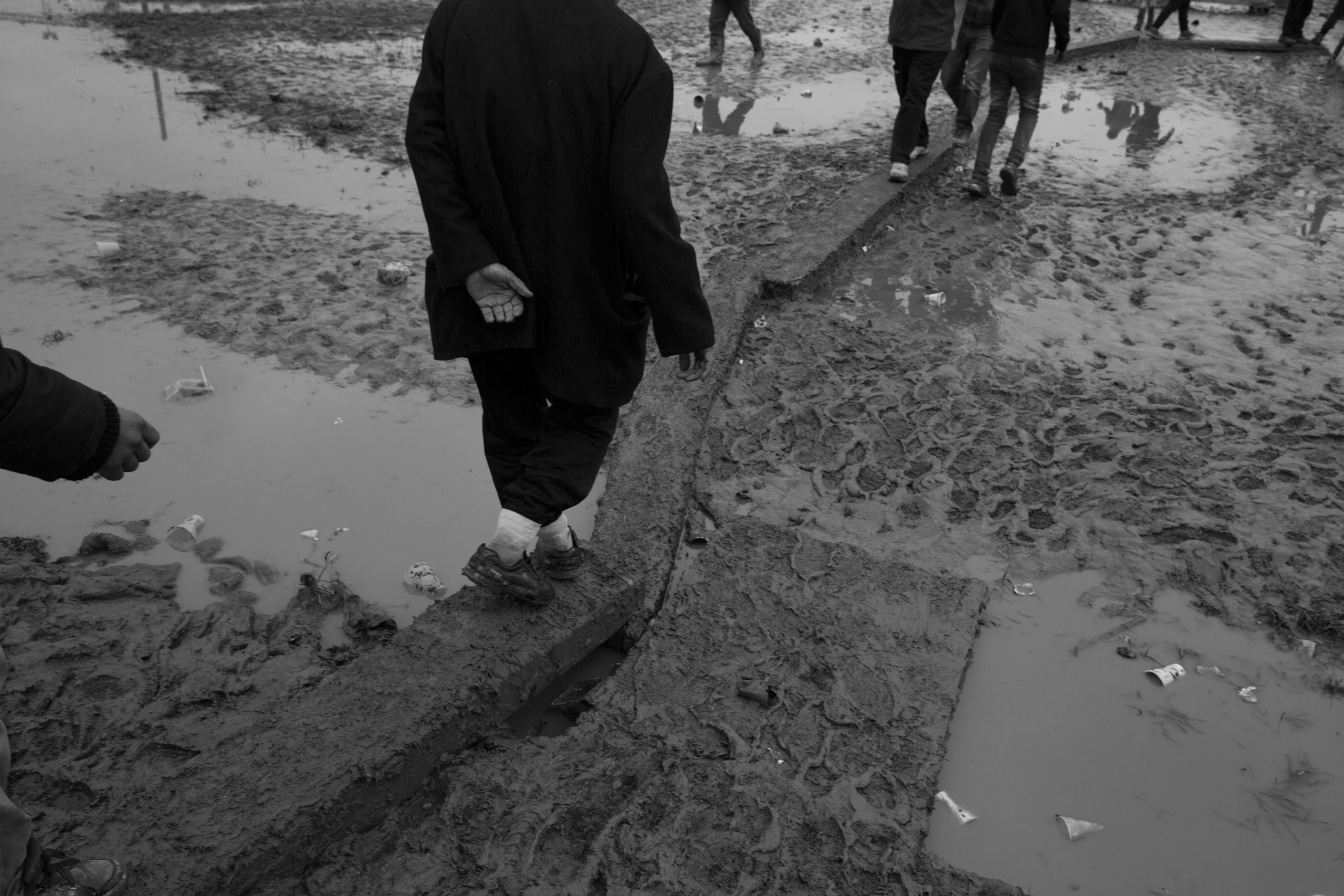 Refugees at the Idomeni camp at the border of Greece and Macedonia, where they have been stranded in the rain, mud and cold, March 16, 2016.