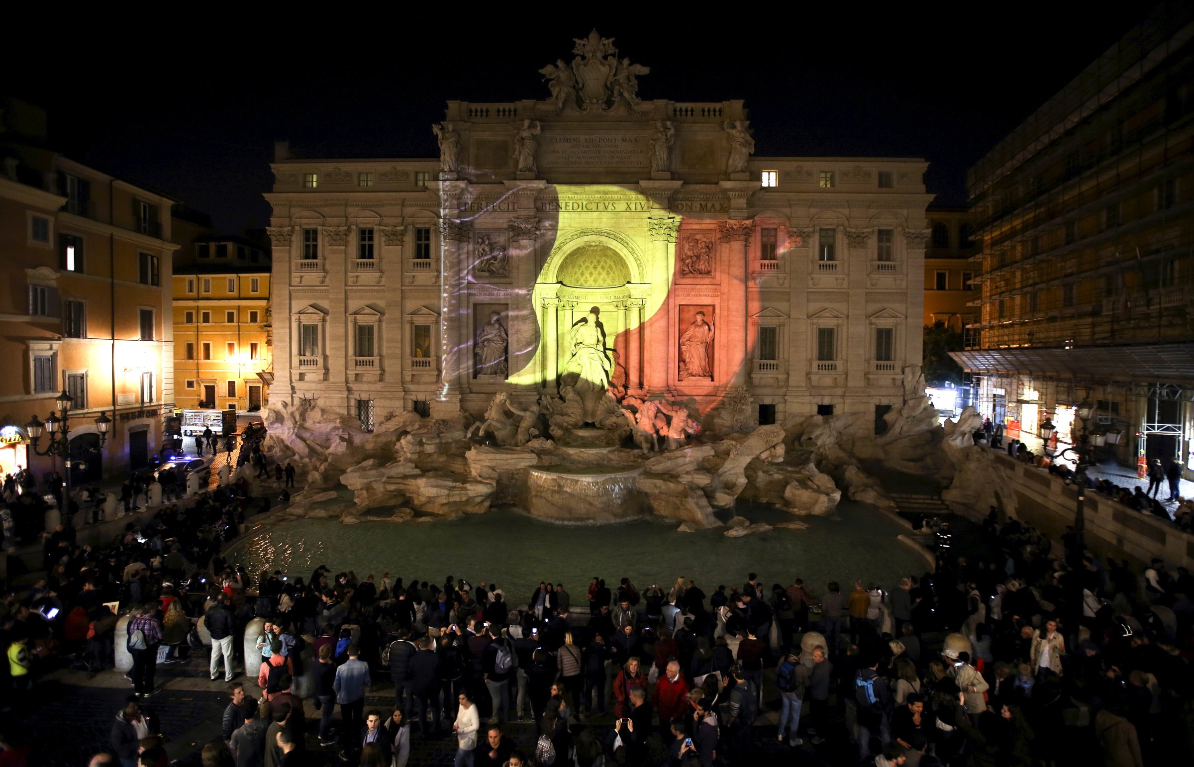 The black, yellow, and red colours of the Belgian flag are projected on the Trevi fountain in Rome, Italy, in tribute to the victims of today's Brussels bomb attacks