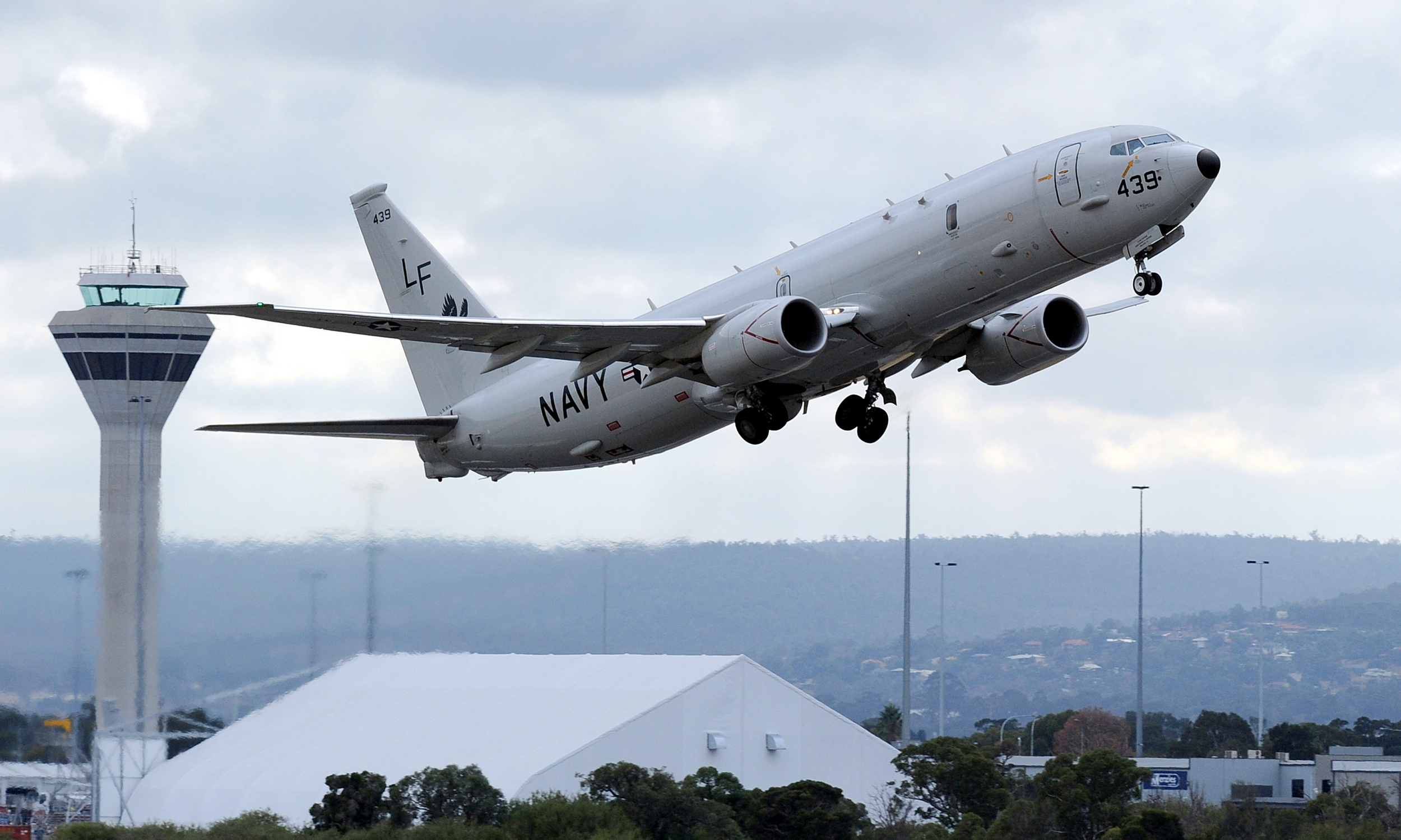 A U.S. Navy P-8 Poseidon aircraft takes off from Perth International Airport on April 16, 2014. (Pool—Reuters)