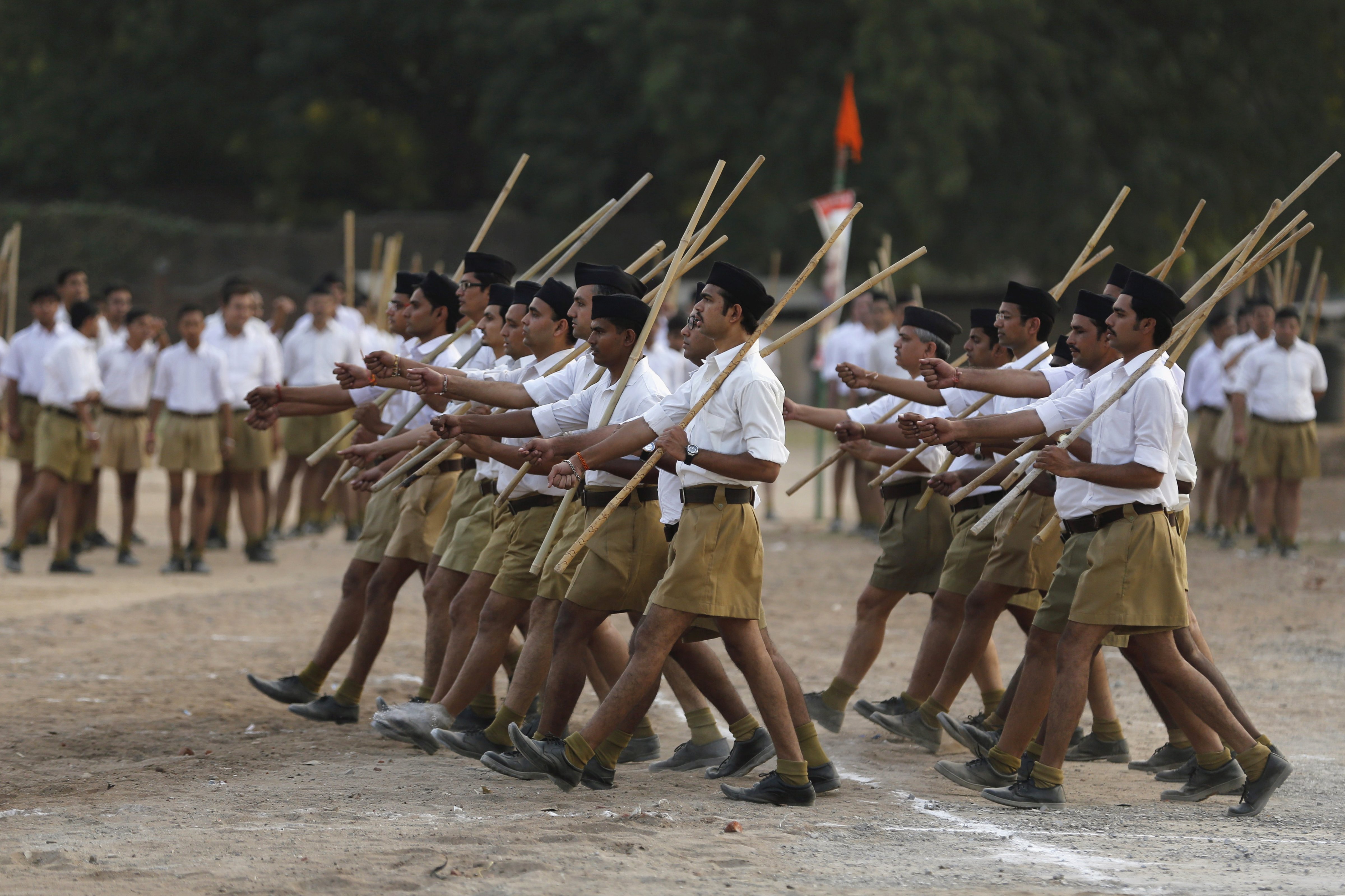 Volunteers of the Hindu nationalist organization Rashtriya Swayamsevak Sangh take part in the <i>Path-Sanchalan</i> (Volunteer March) during celebrations to mark the festival of Dussehra in Ahmedabad, India, on Oct. 18, 2015 (Amit Dave—Reuters)