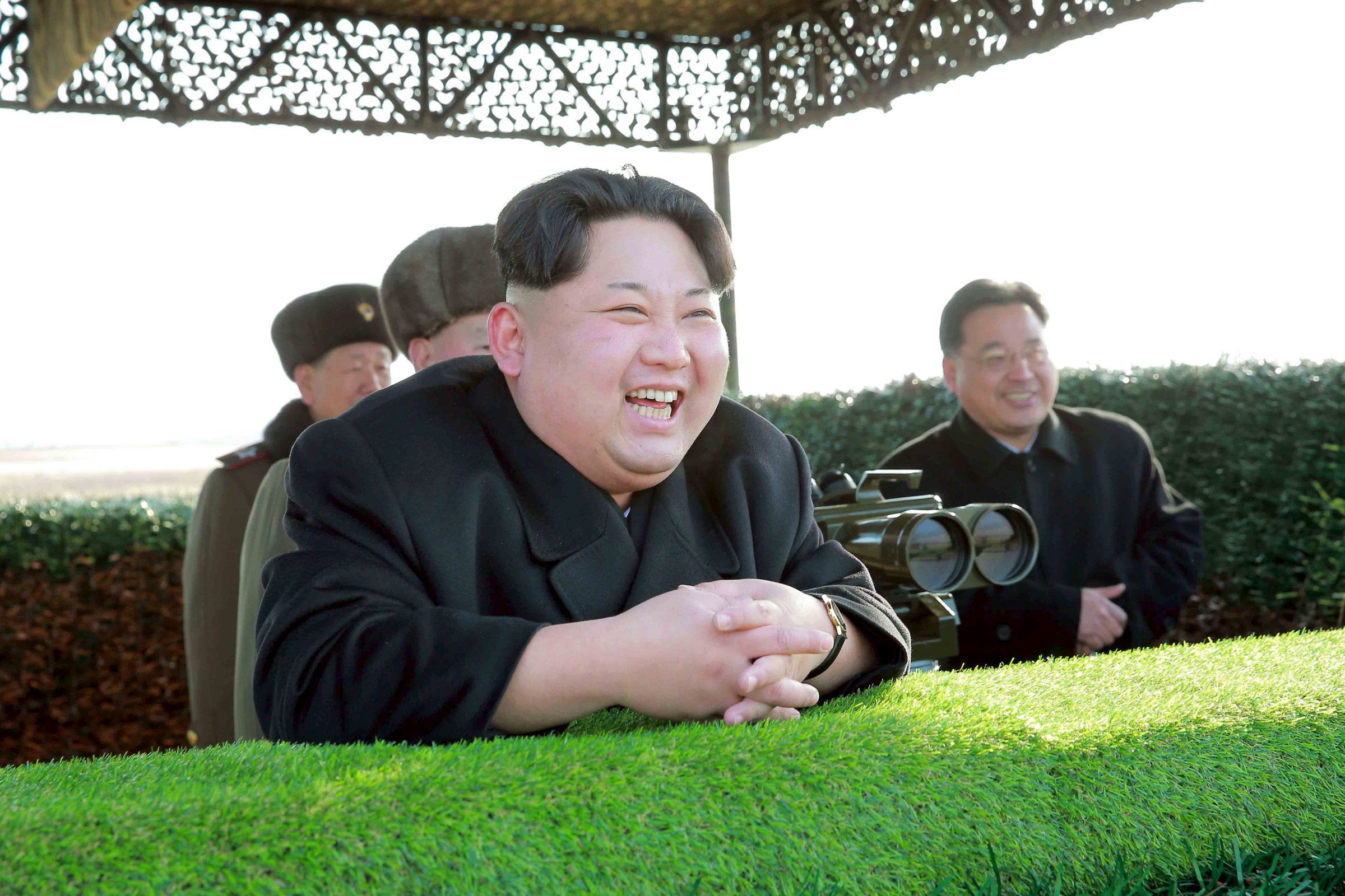 North Korean leader Kim Jong Un reacts during a test-fire of an anti-tank guided weapon in this undated photo released by North Korea's Korean Central News Agency (KCNA) in Pyongyang