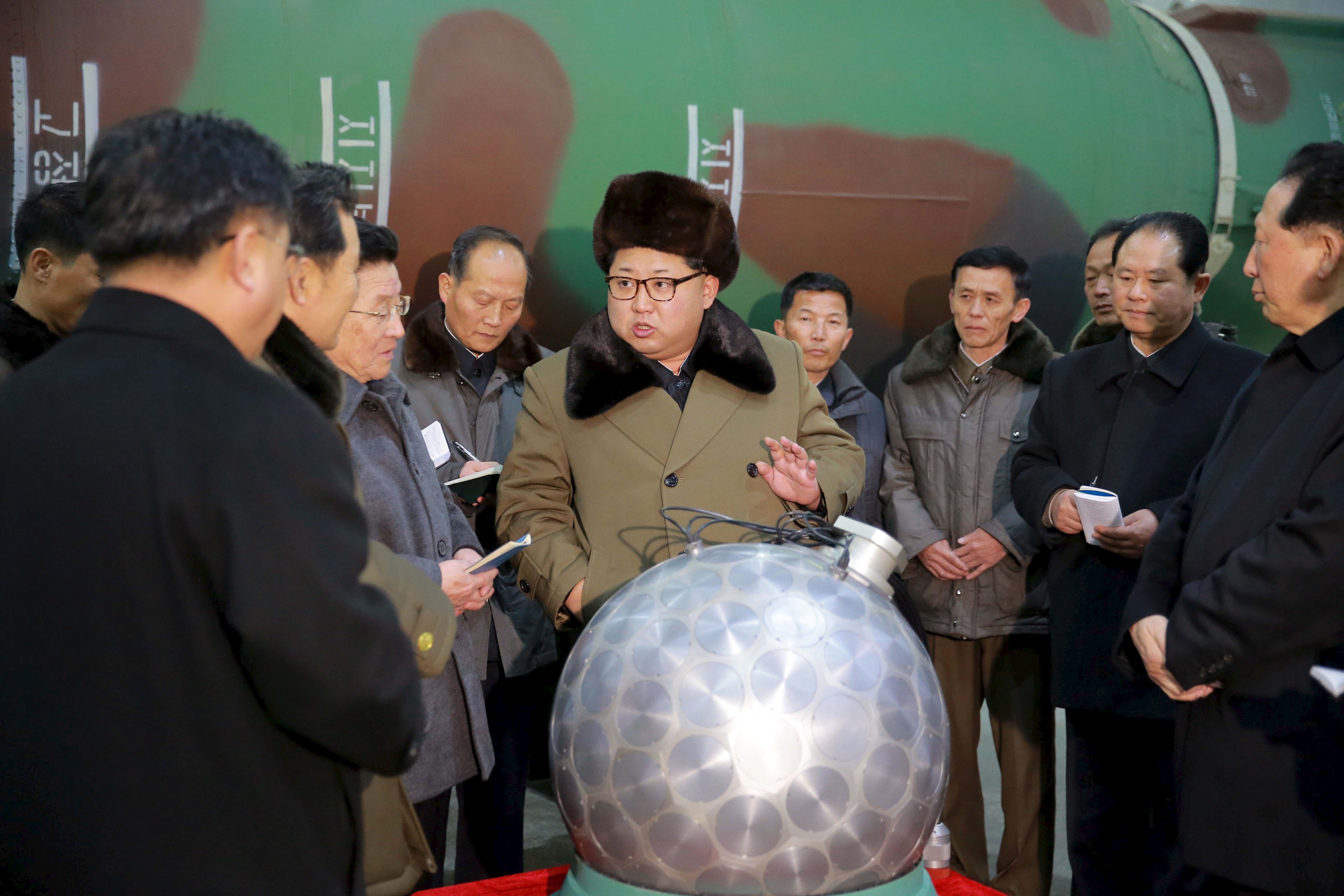 North Korean leader Kim Jong Un meets scientists and technicians in this undated photo released by North Korea's Korean Central News Agency (KCNA) in Pyongyang March 9, 2016 (KCNA—Reuters)