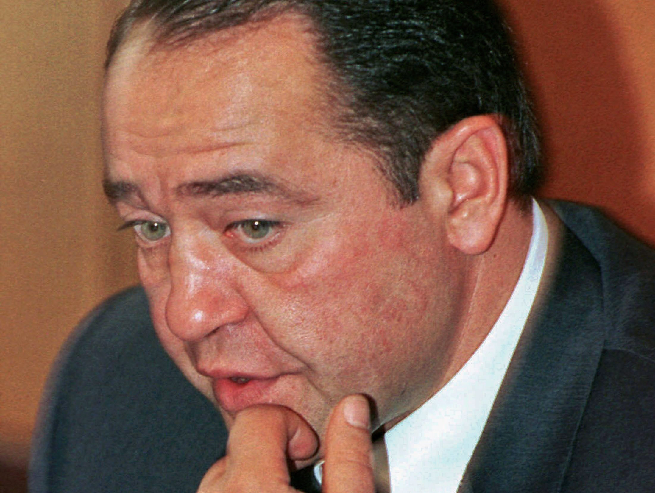 Former Russian Media Minister Mikhail Lesin gestures during a news conference in Moscow, Sept. 20, 2000. Lesin, who once headed state-controlled media giant Gazprom-Media, died of blunt force injuries to the head last year in Washington, authorities said March 10, 2016.
