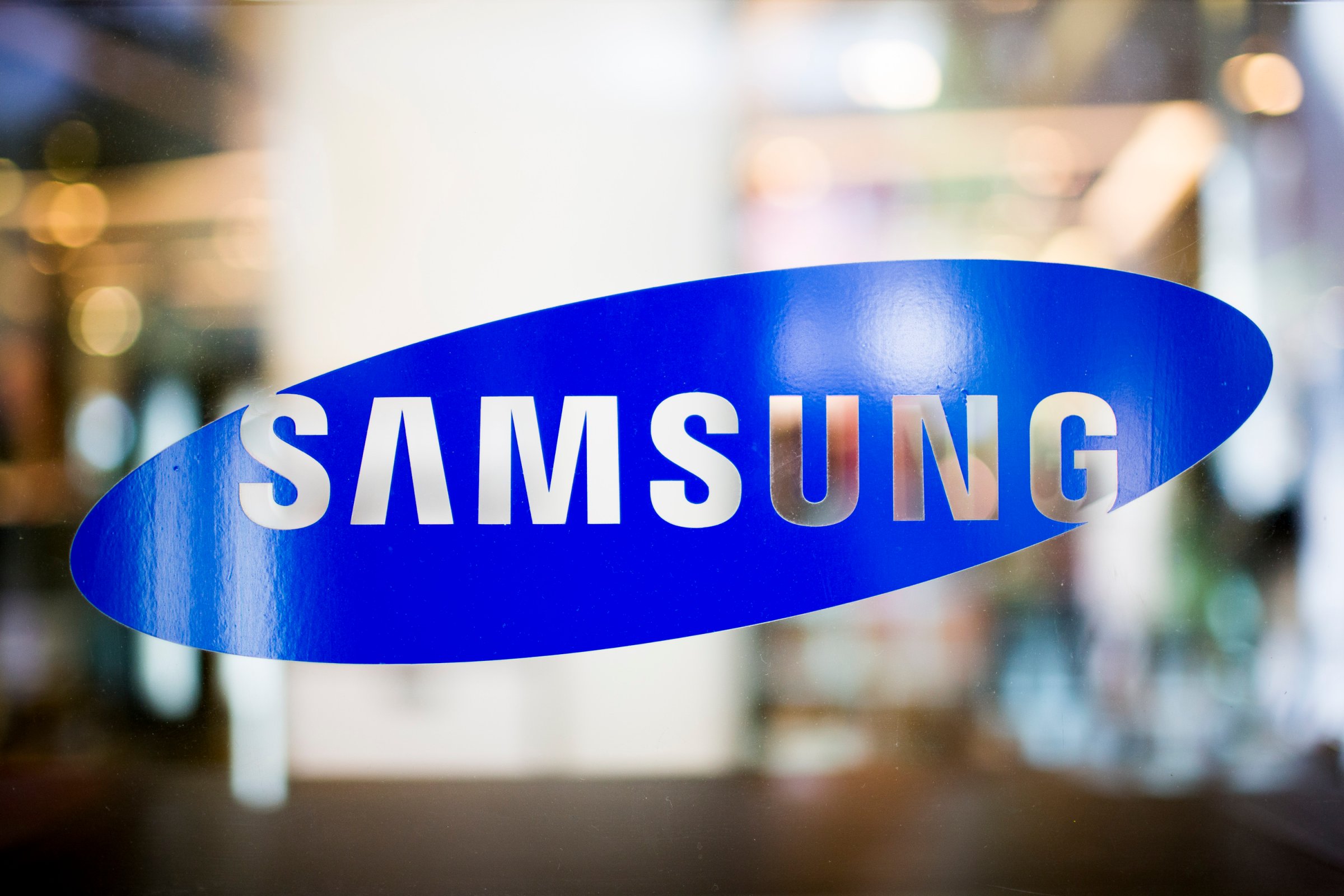 The Samsung Electronics Co. logo is displayed at a store in Bangkok, Thailand, on Thursday, Oct. 4, 2012.