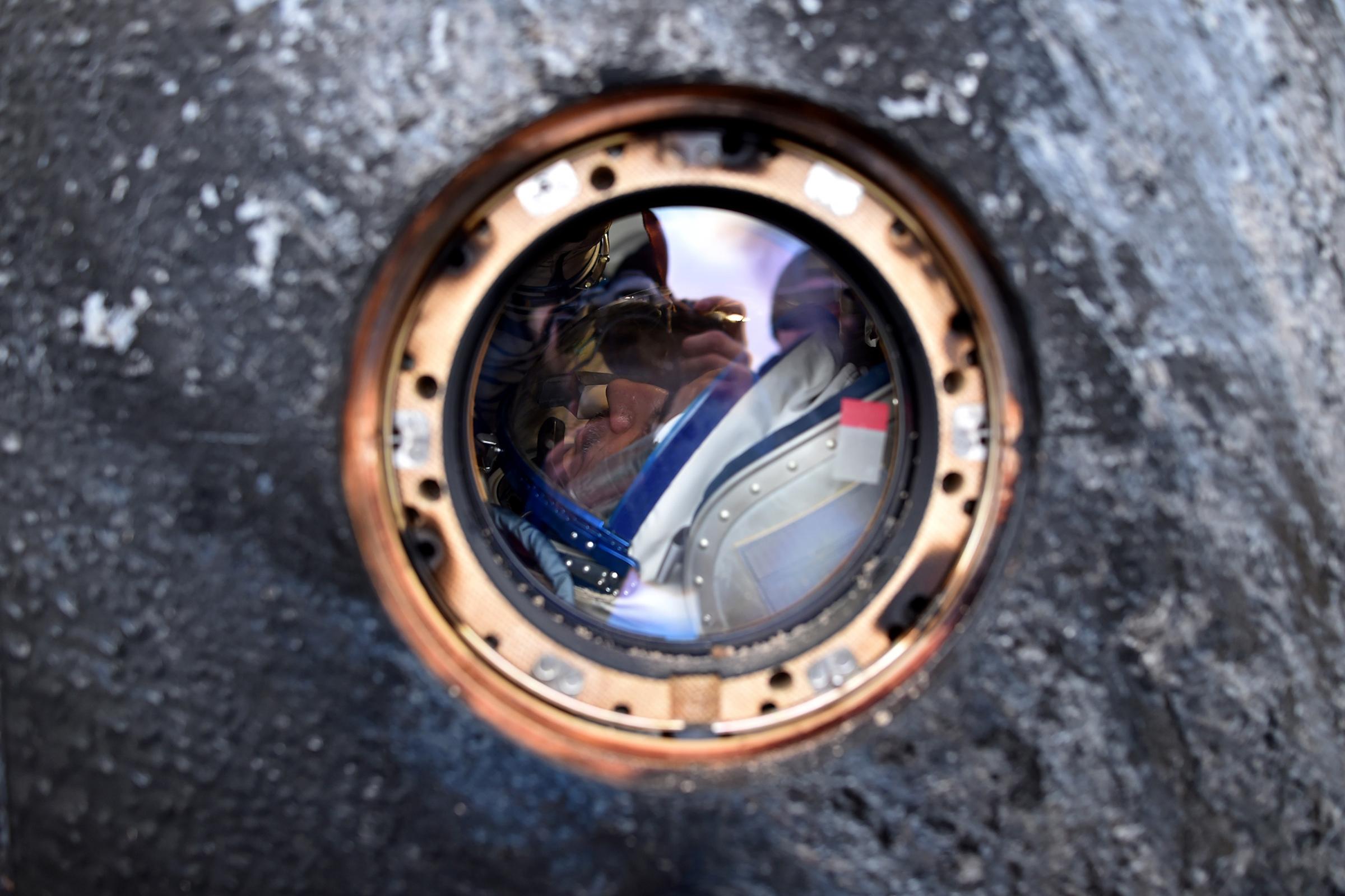 Mikhail Kornienko of Russia is seen inside the Soyuz TMA-18M space capsule after landing in Kazakhstan, on March 2, 2016.