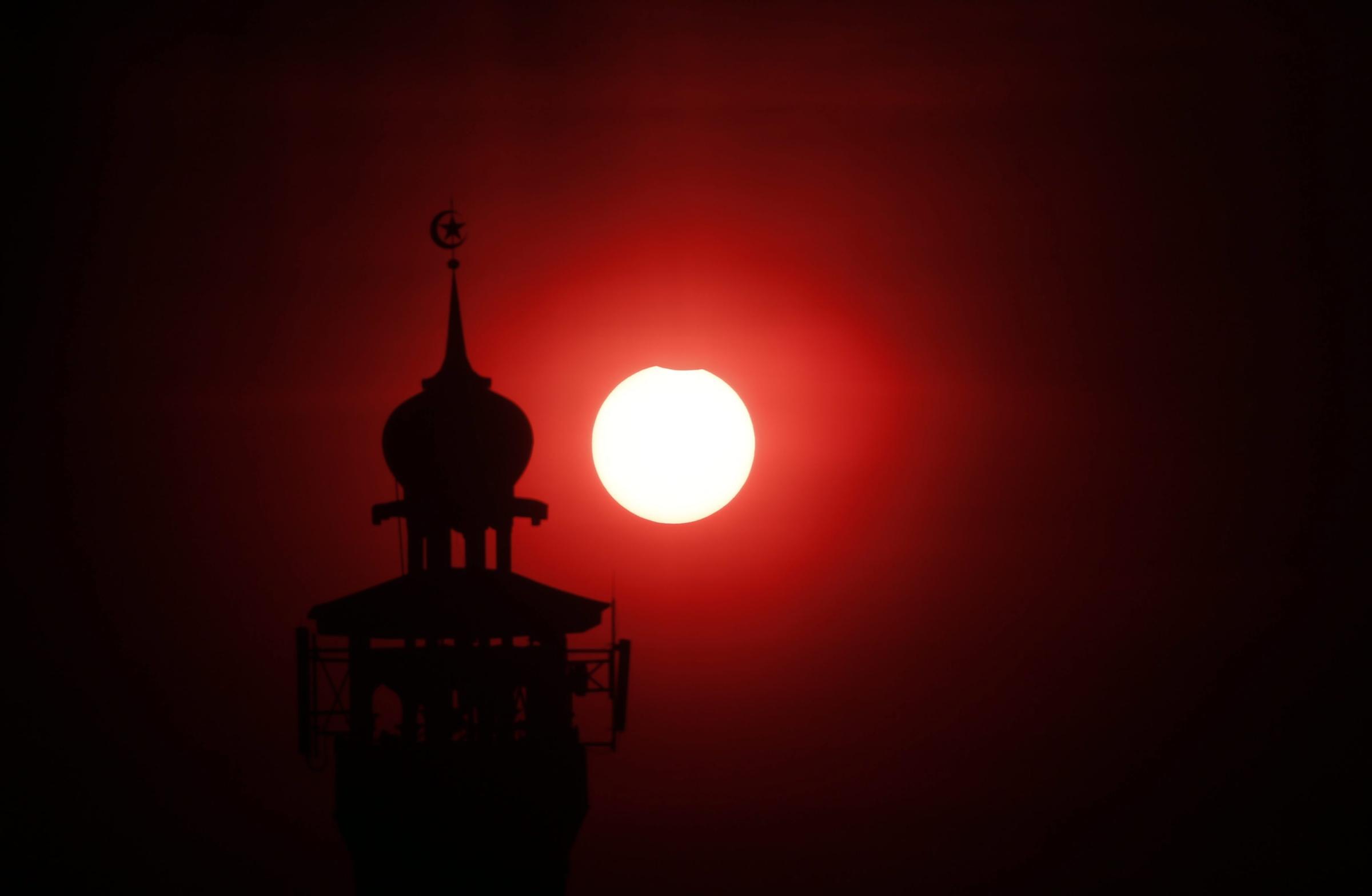 A partial solar eclipse is seen from Jakarta, Indonesia, on March 9, 2016.