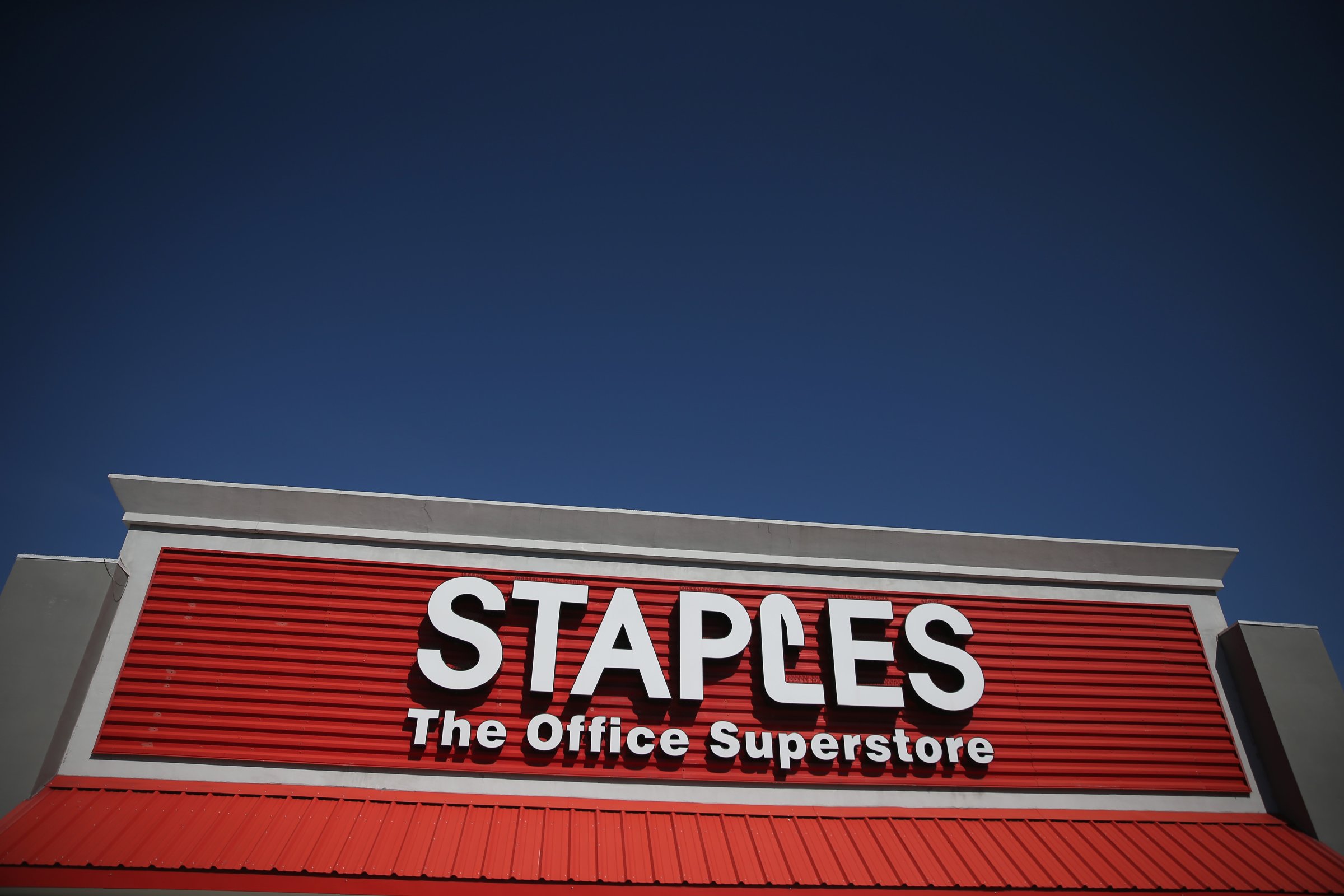 The sign logo for a Staples store is seen on February 3, 2015 in Miami, Florida.