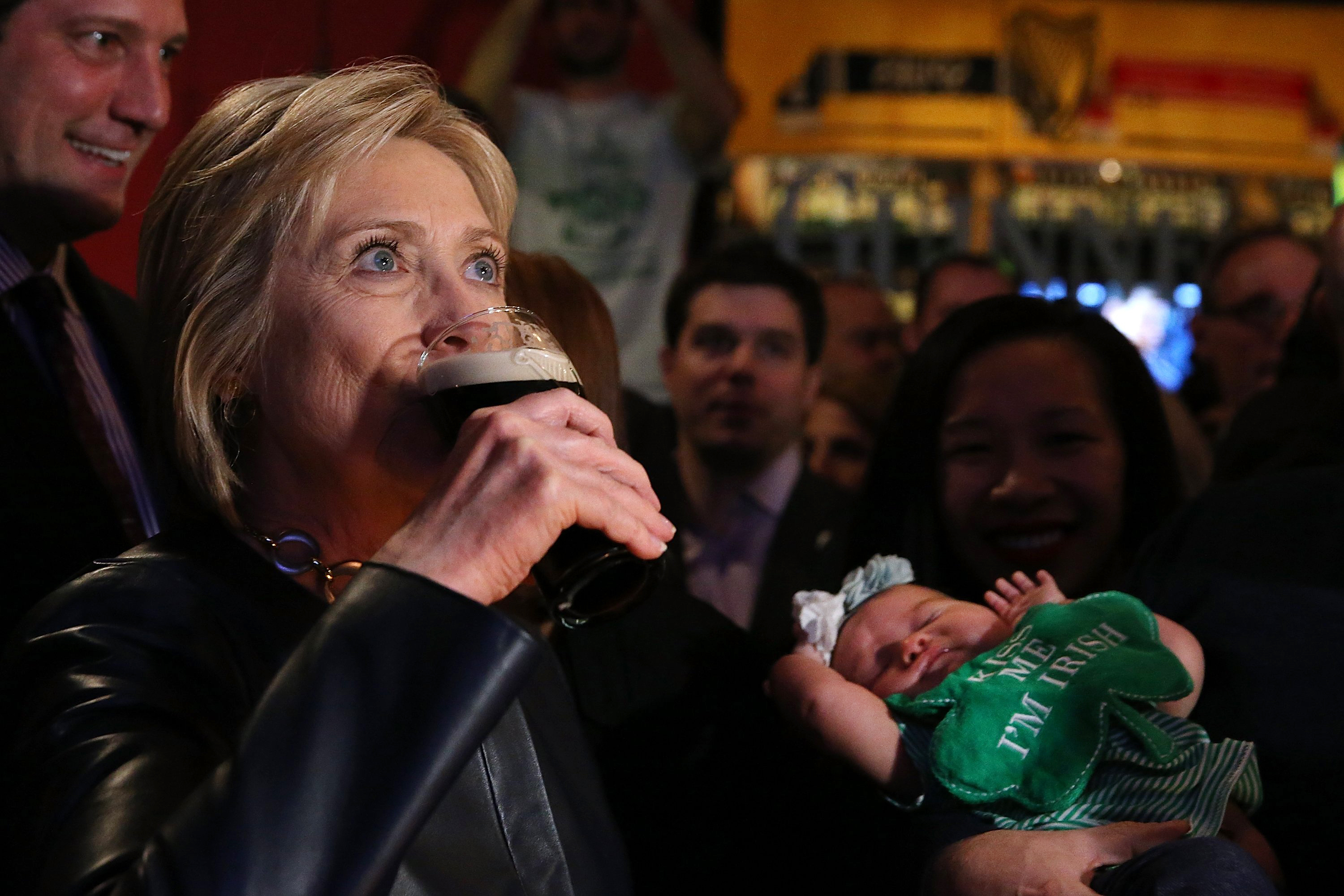 Democratic presidential candidate, former Secretary of State Hillary Clinton drinks a pint of Guinness beer at O'Donold's Irish Pub and Grill on March 12, 2016 in Youngstown, Ohio.