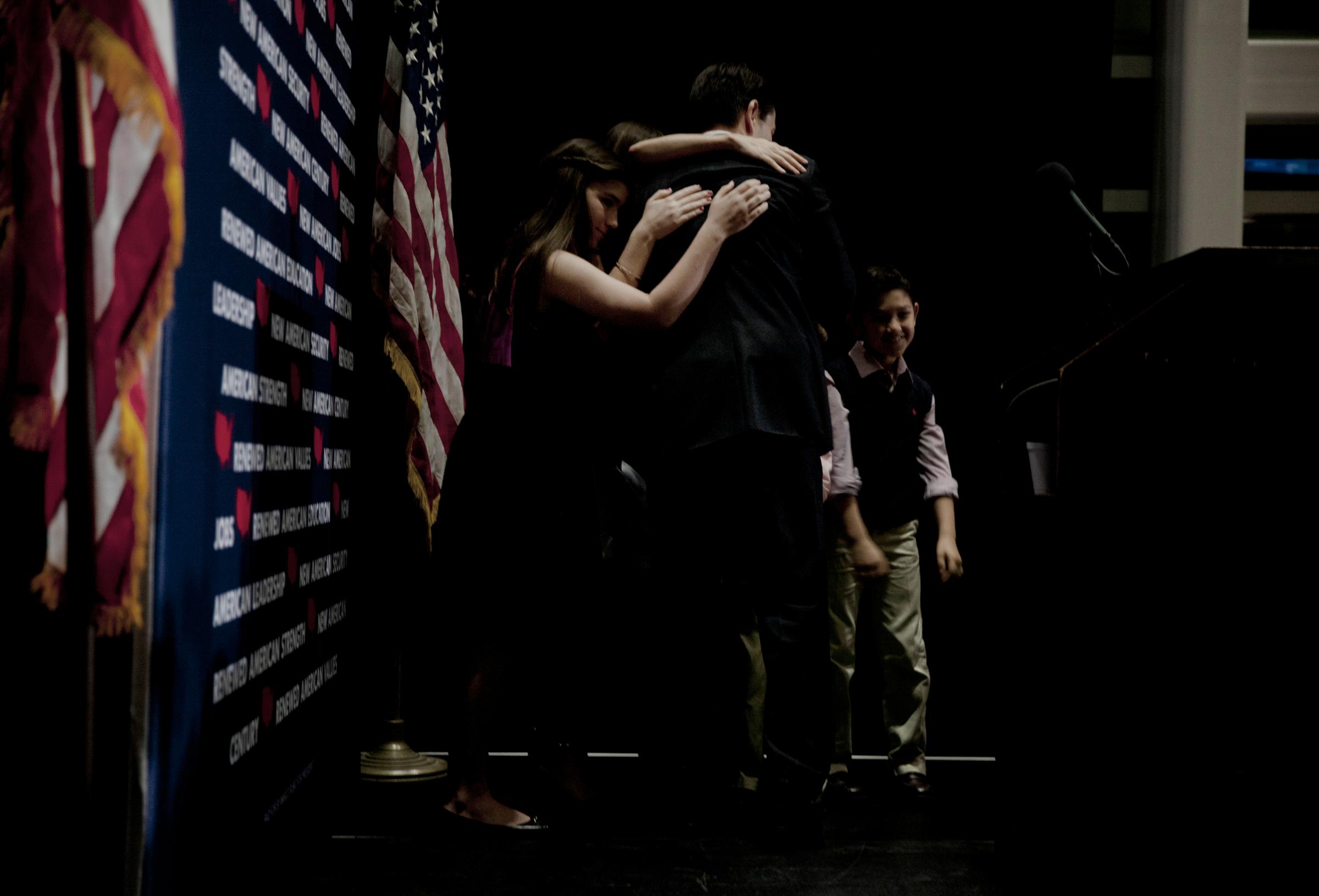 Republican presidential candidate, Florida Sen. Marco Rubio hugs his family as he suspends his presidential campaign on March 15 in Miami.