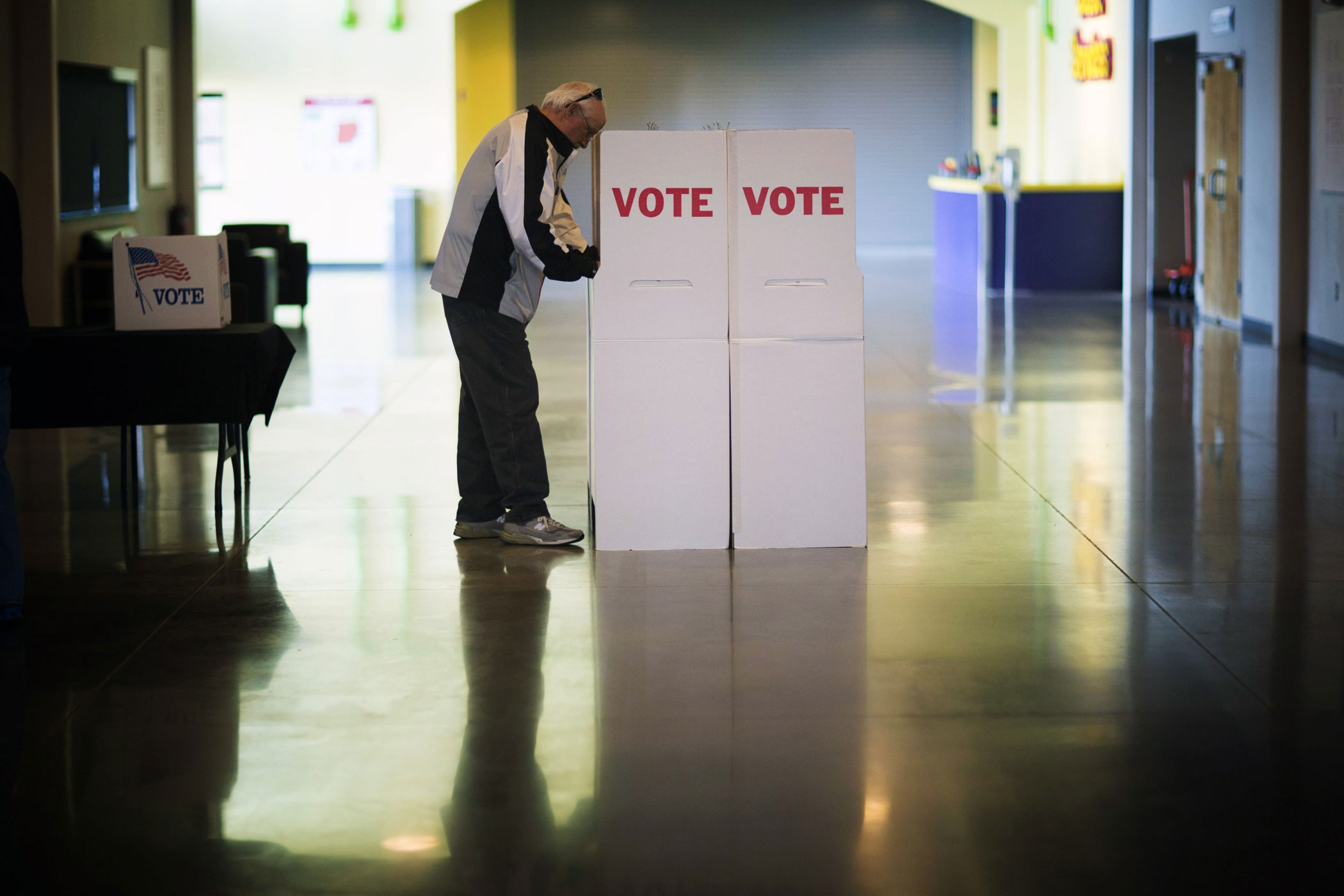 A man casts his ballot at a polling center in Edmond, Okla. on March 1.