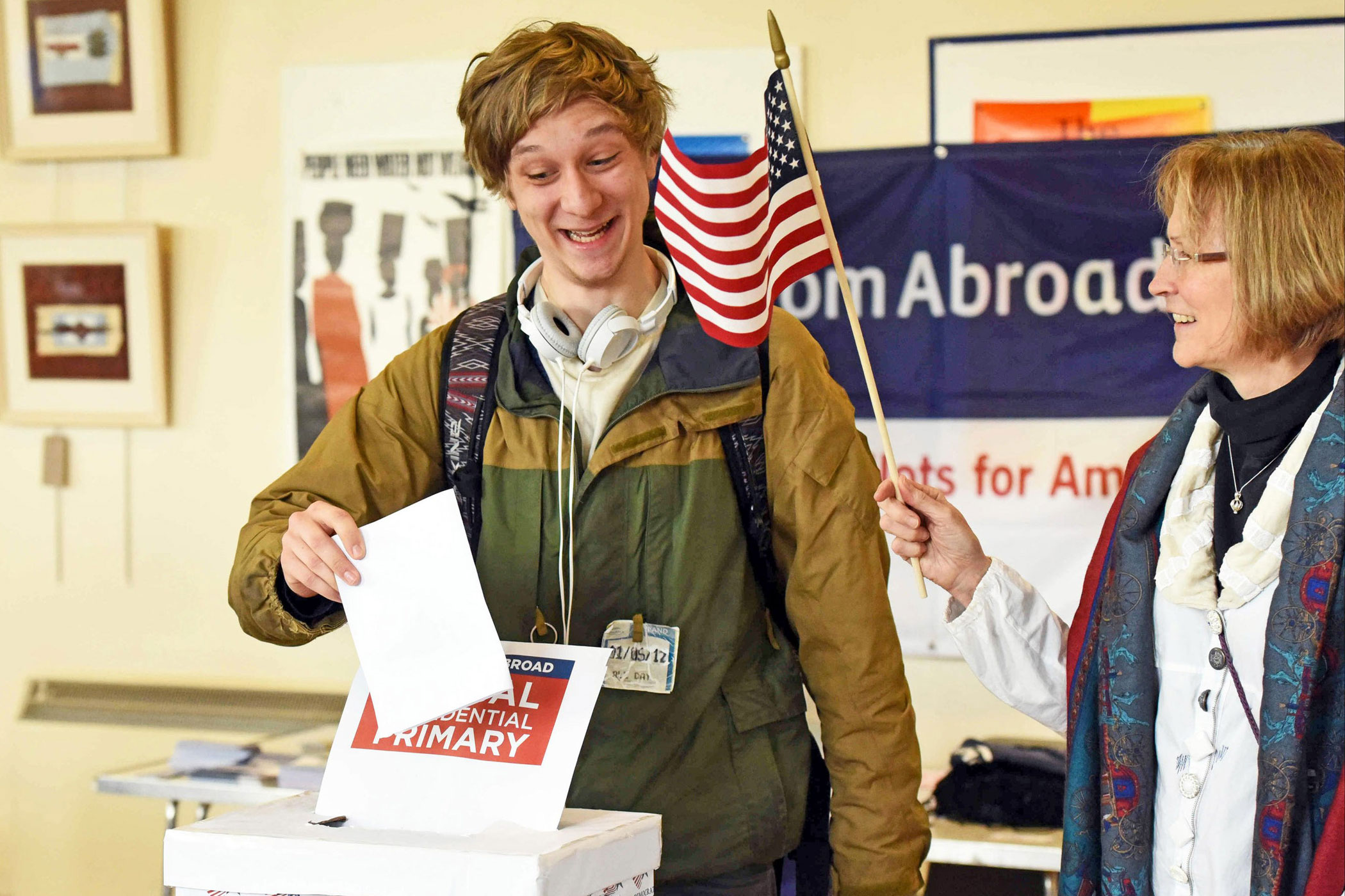 As Super Tuesday gets under way in United States presidential primary race, an American voter casts his ballot in Edinburgh, Scotland in the global presidential primary, a Democratic effort that allows Americans overseas to help choose delegates.
