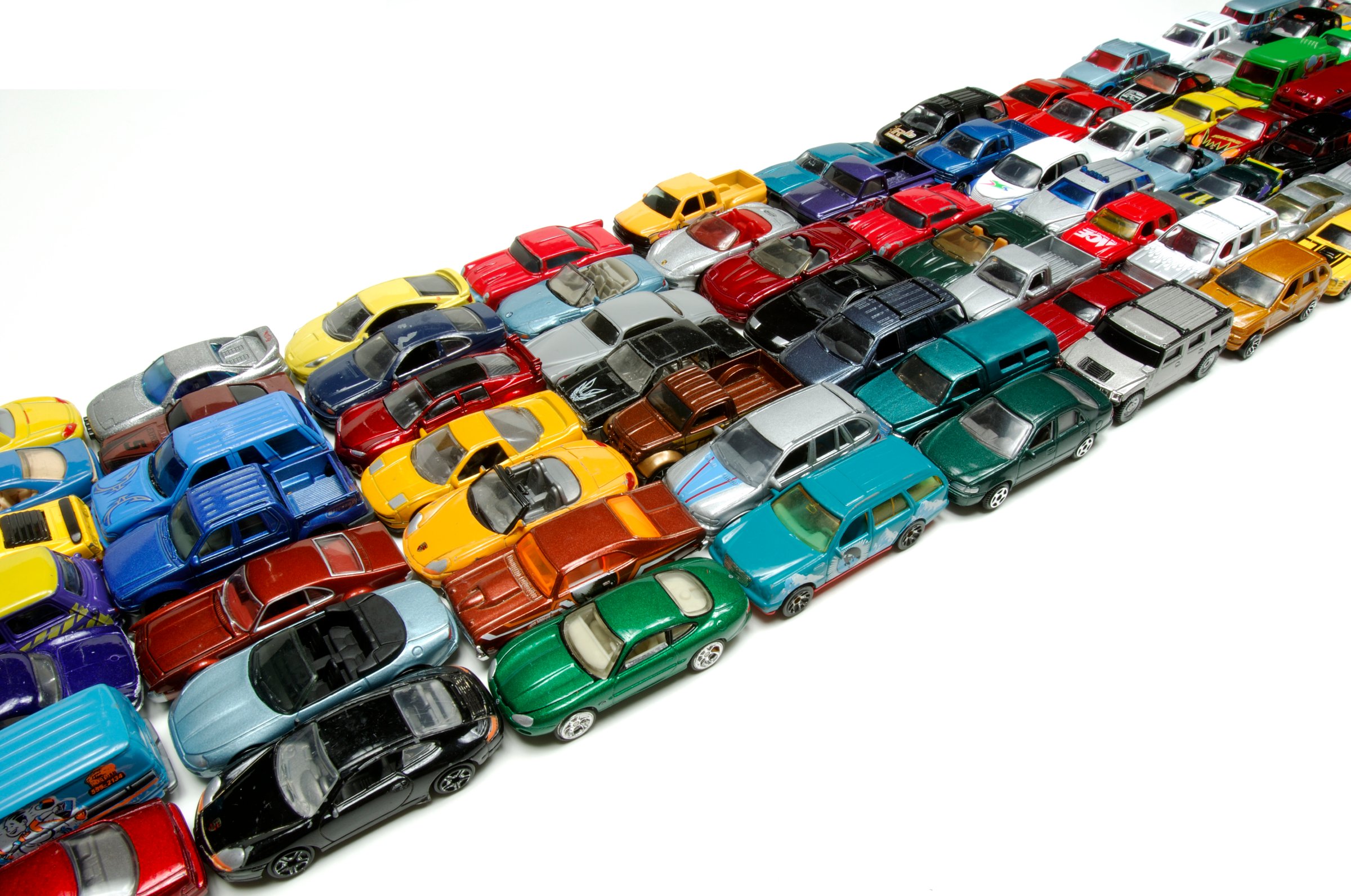 Miniature cars lined up in five lanes of traffic, side view, close-up-003