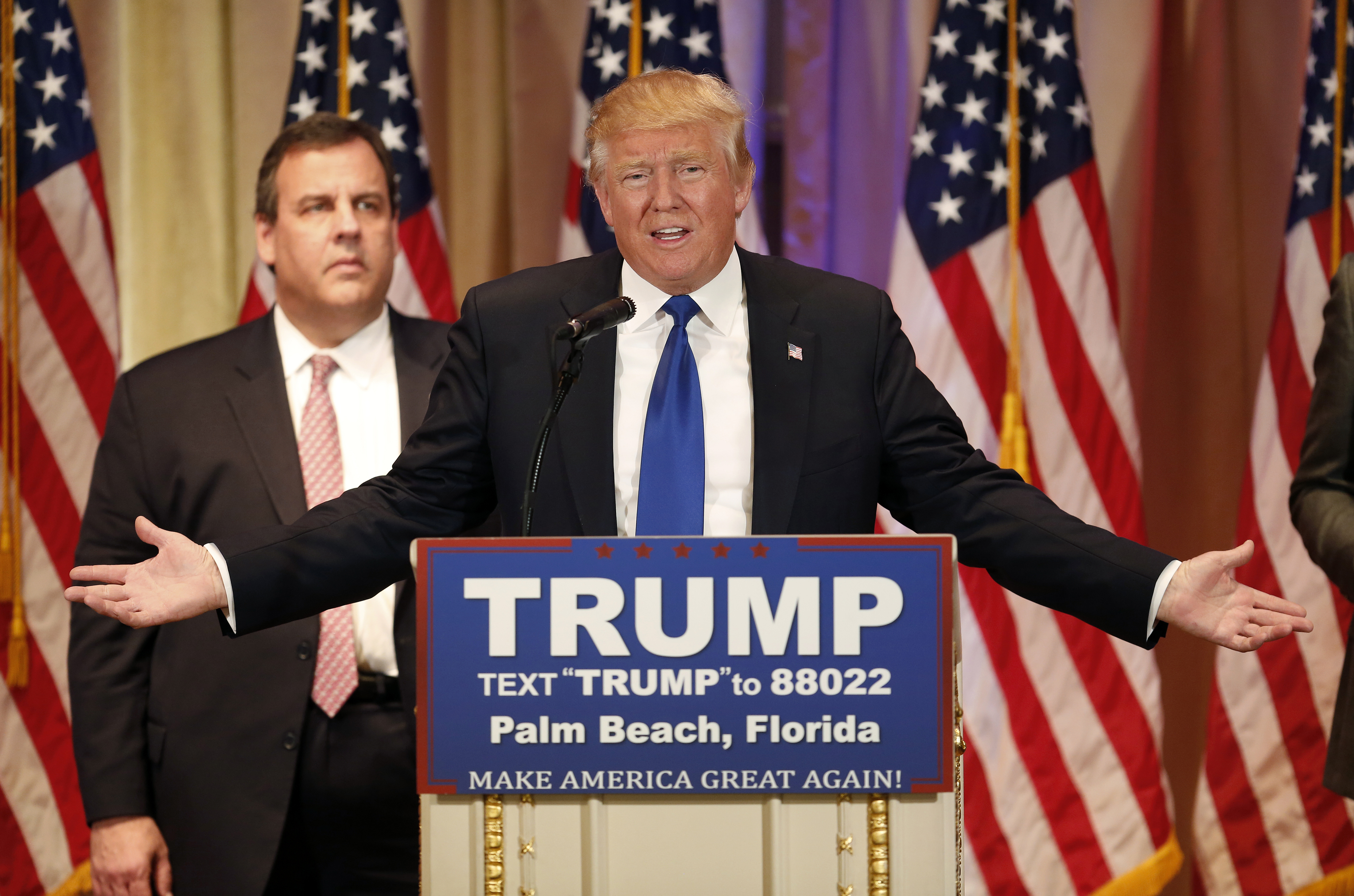 Donald Trump speaks on stage with Chris Christie in Palm Beach, Florida, on March 1, 2016. (Luke Sharrett—Bloomberg/Getty Images)