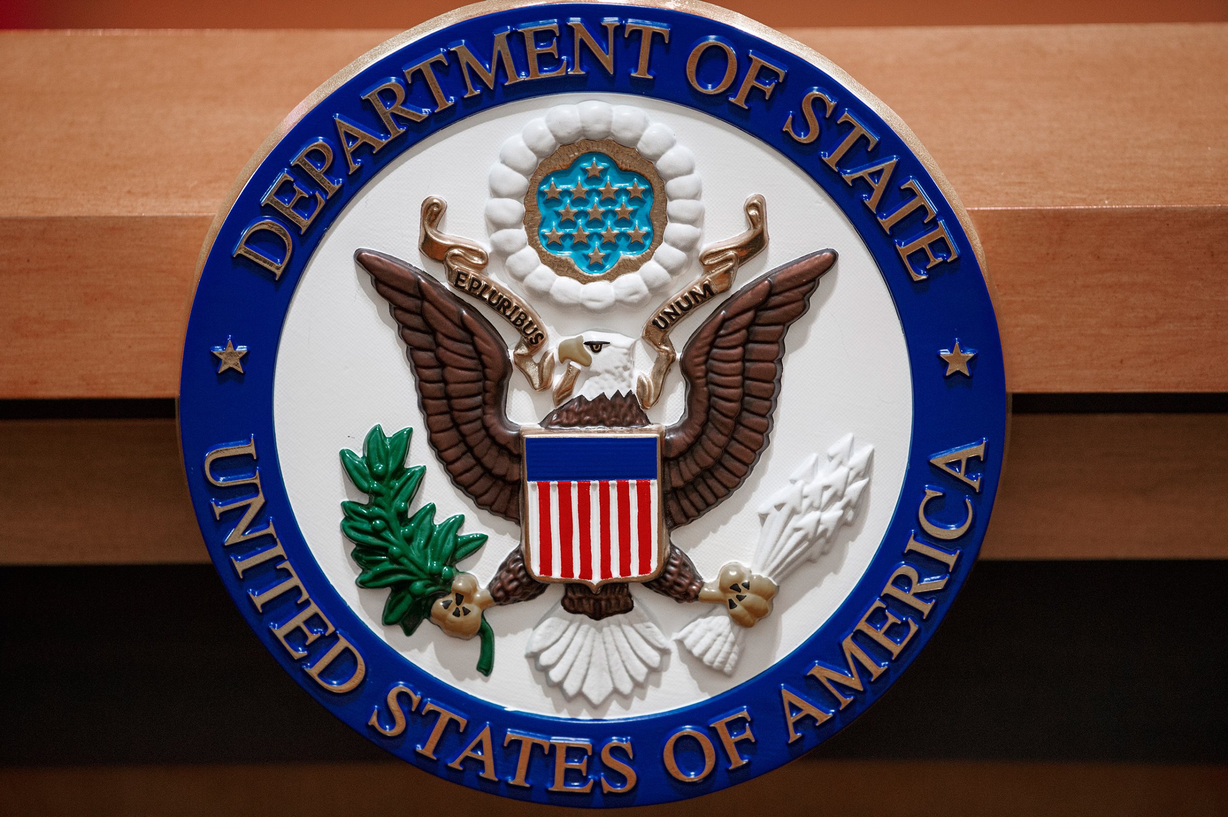 The seal of the U.S. Department of State is seen on the lectern in a briefing room in Washington, D.C., Nov. 26, 2013.
