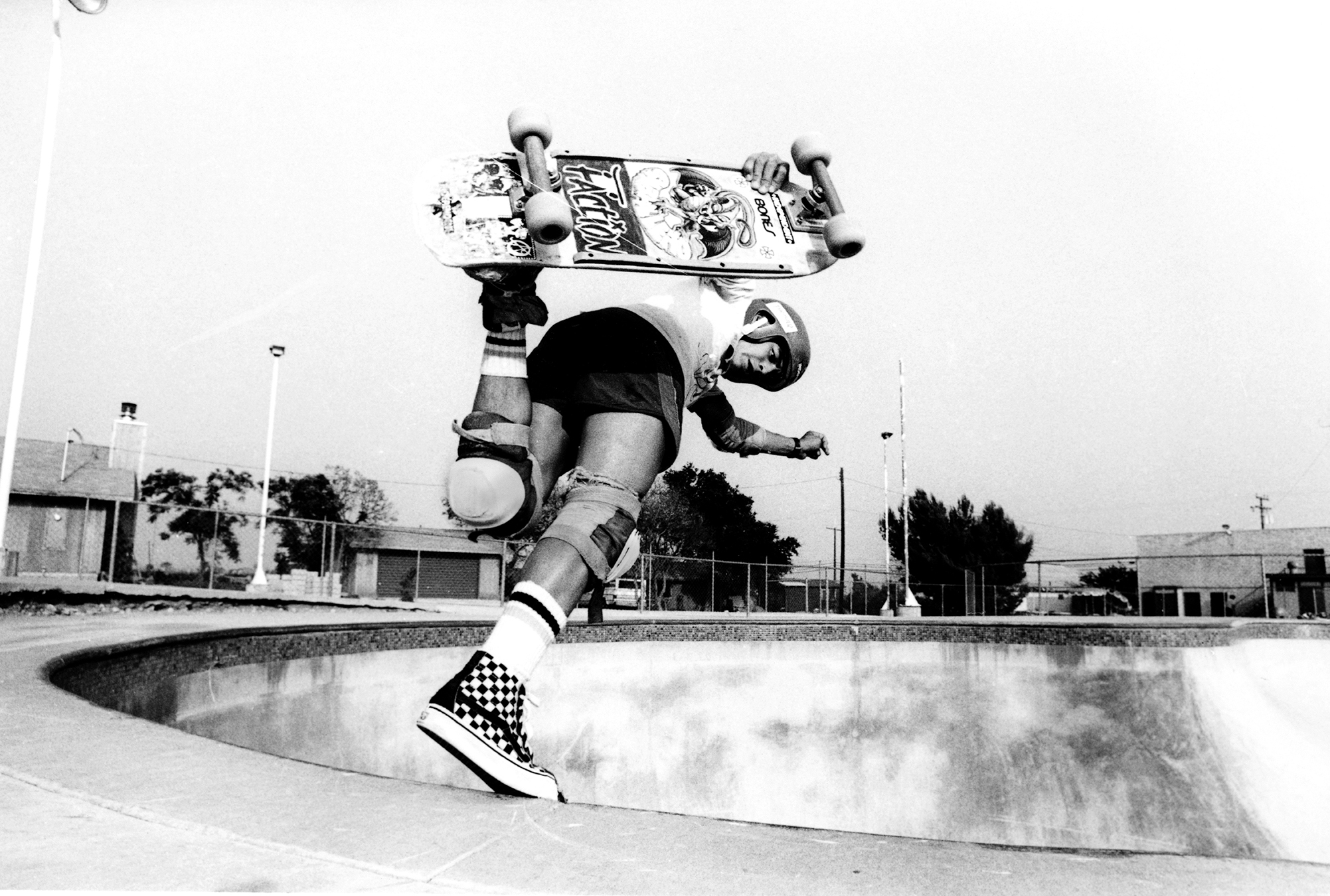 Professional skater Steve Caballero skates wearing a pair of Vans checkerboard high tops in 1984.