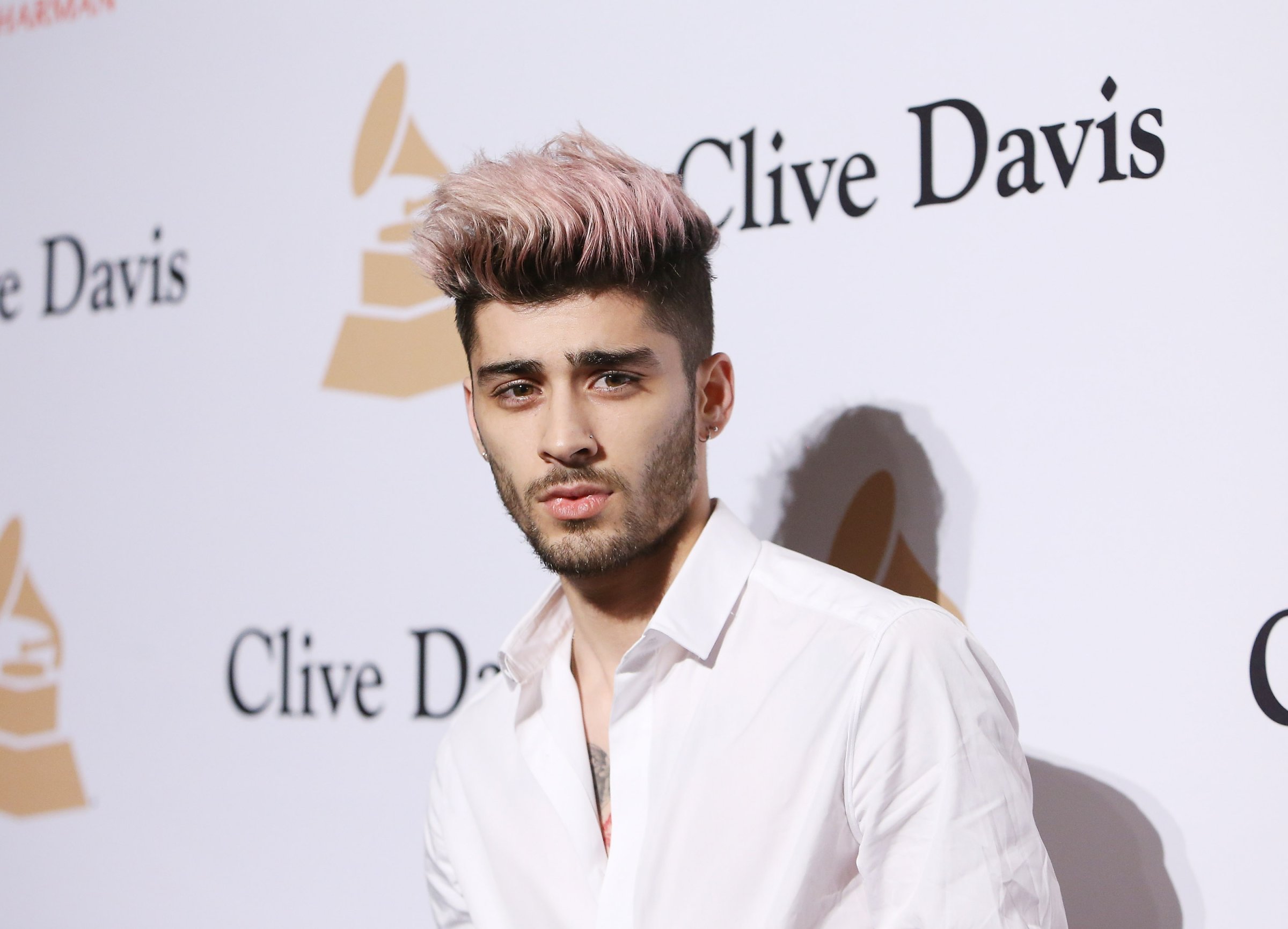 Zayn Malik arrives at the 2016 Pre-GRAMMY Gala and Salute to Industry Icons honoring Irving Azoff held at The Beverly Hilton Hotel on February 14, 2016 in Beverly Hills, California.