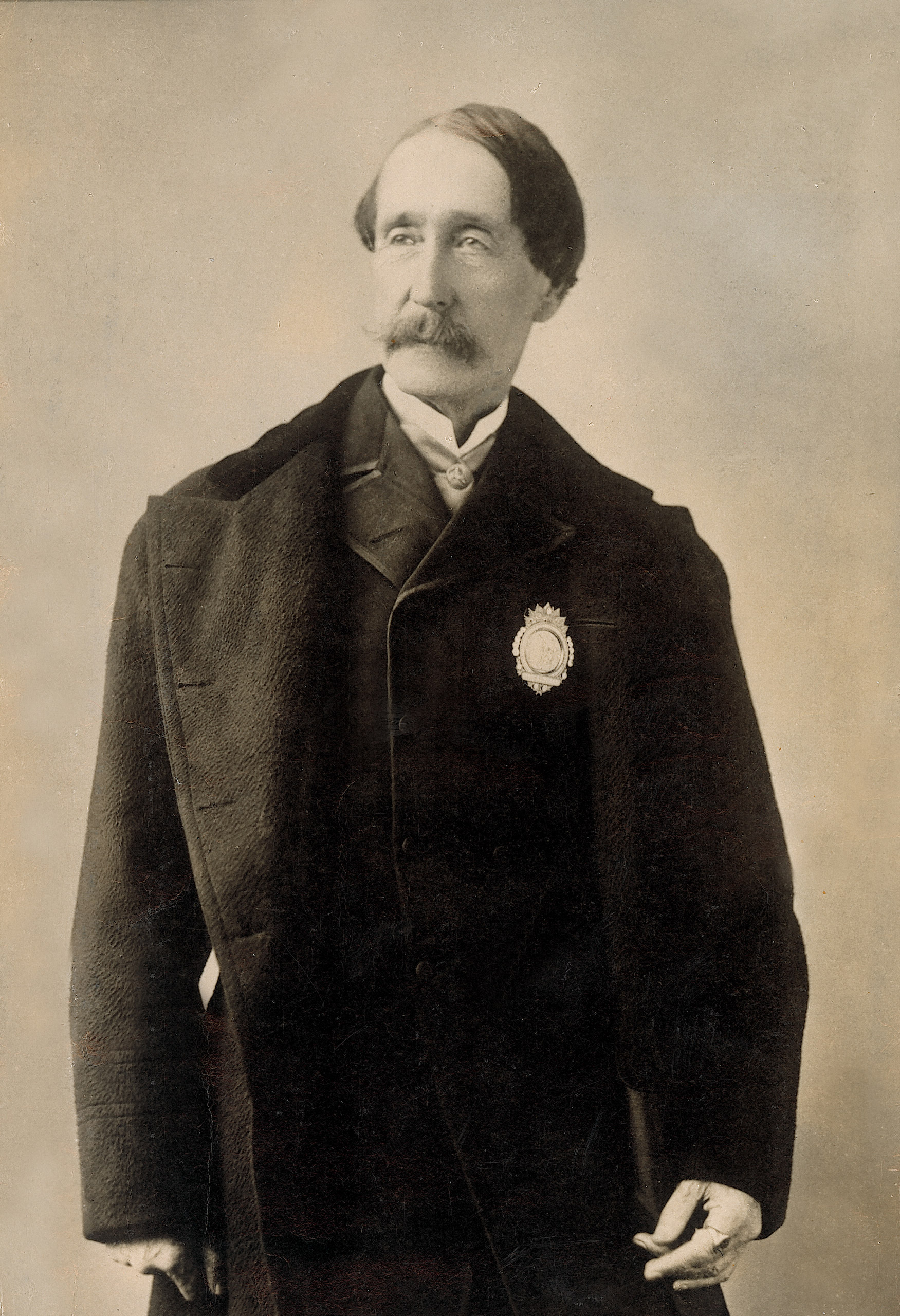 ASPCA founder, Henry Bergh, wearing ASPCA President’s badge, 1868
