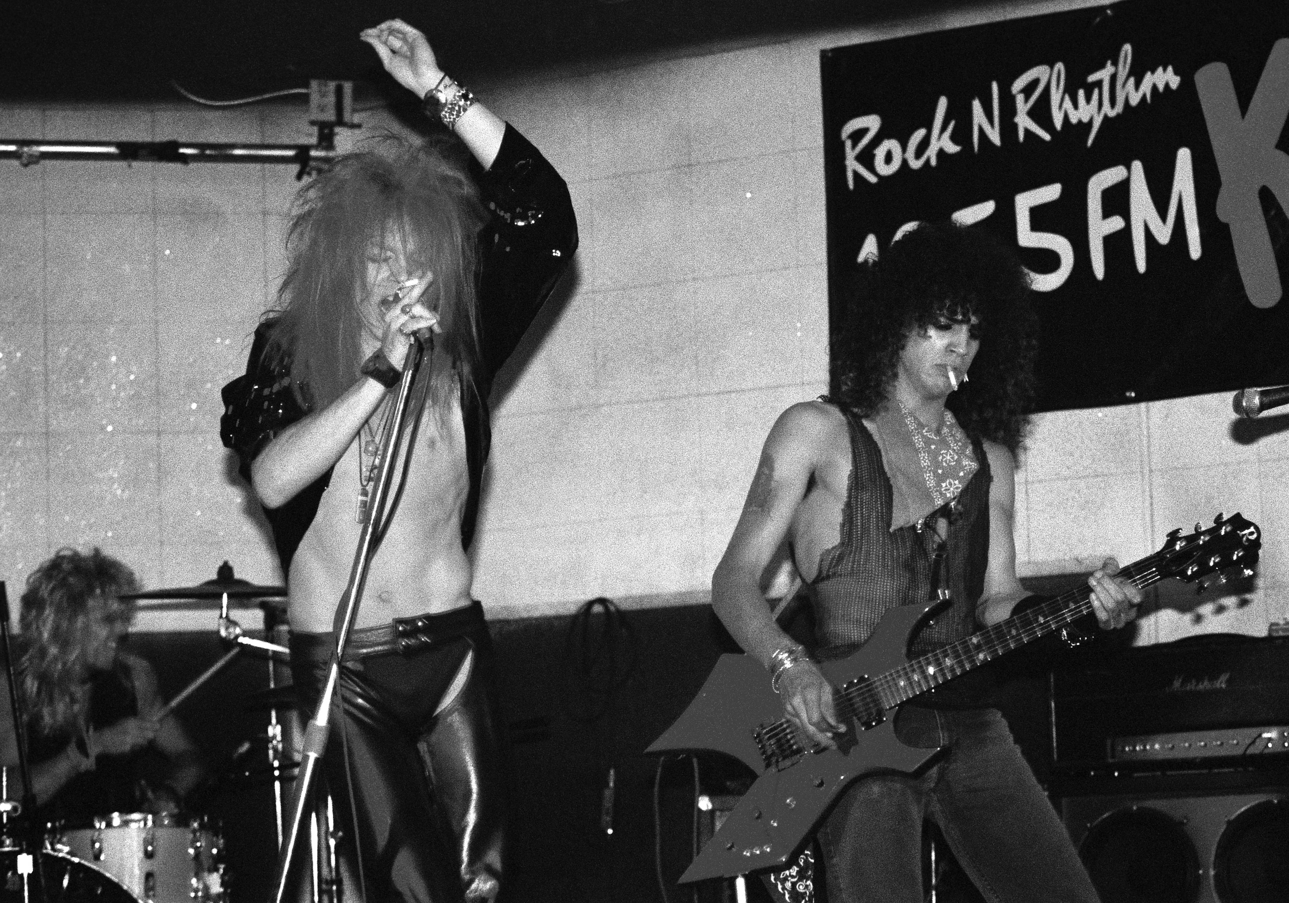 Steven Adler, Axl Rose and Slash of Guns n' Roses perform for a very small crowd at Madame Wong's East on July 4, 1985  in Los Angeles