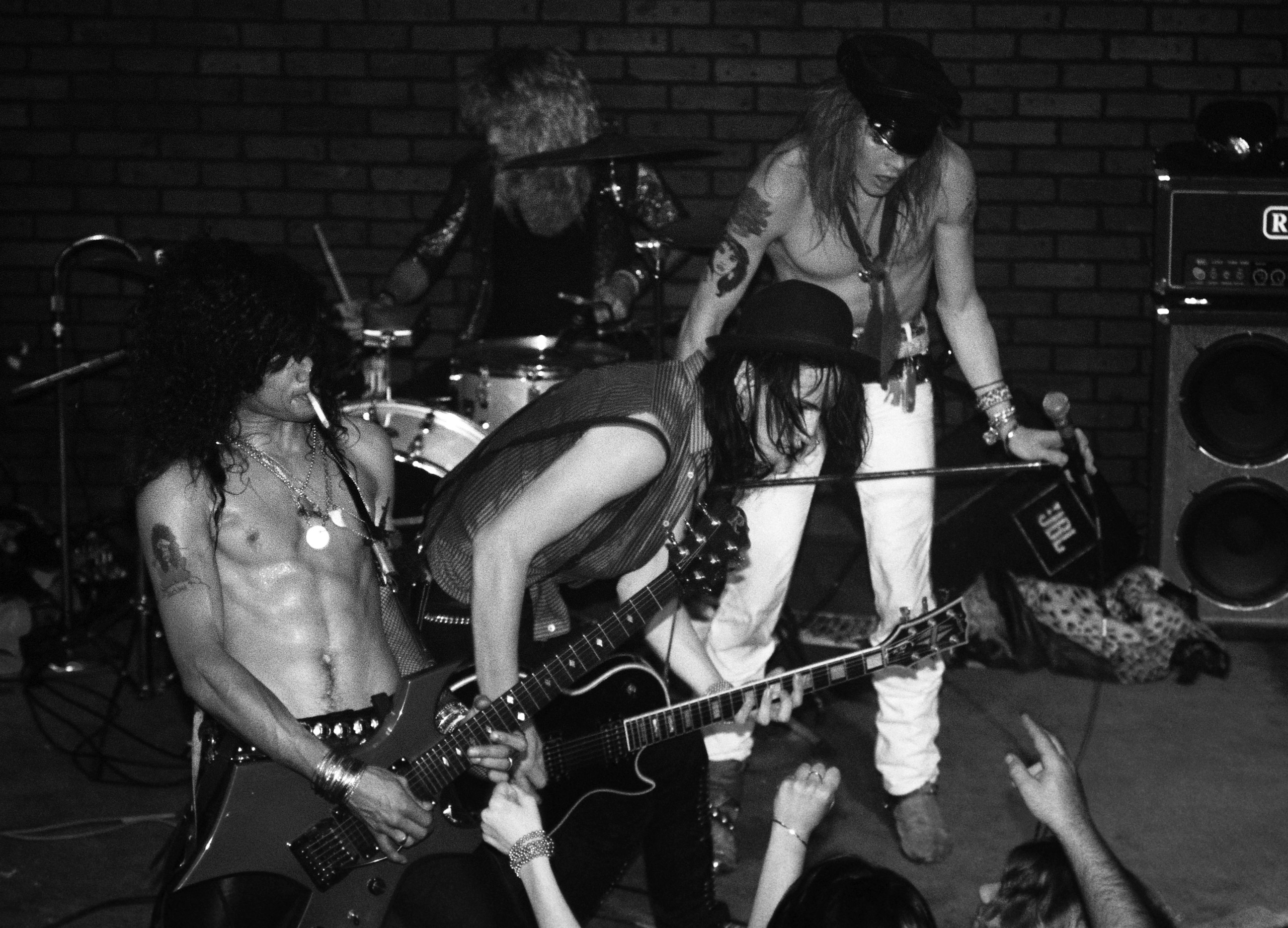 Slash, Steven Adler, Axl Rose and Izzy Stradlin of Guns n' Roses perform  at the Troubadour where they played 'Rocket Queen' for the first time on Sept. 20, 1985 in Los Angeles