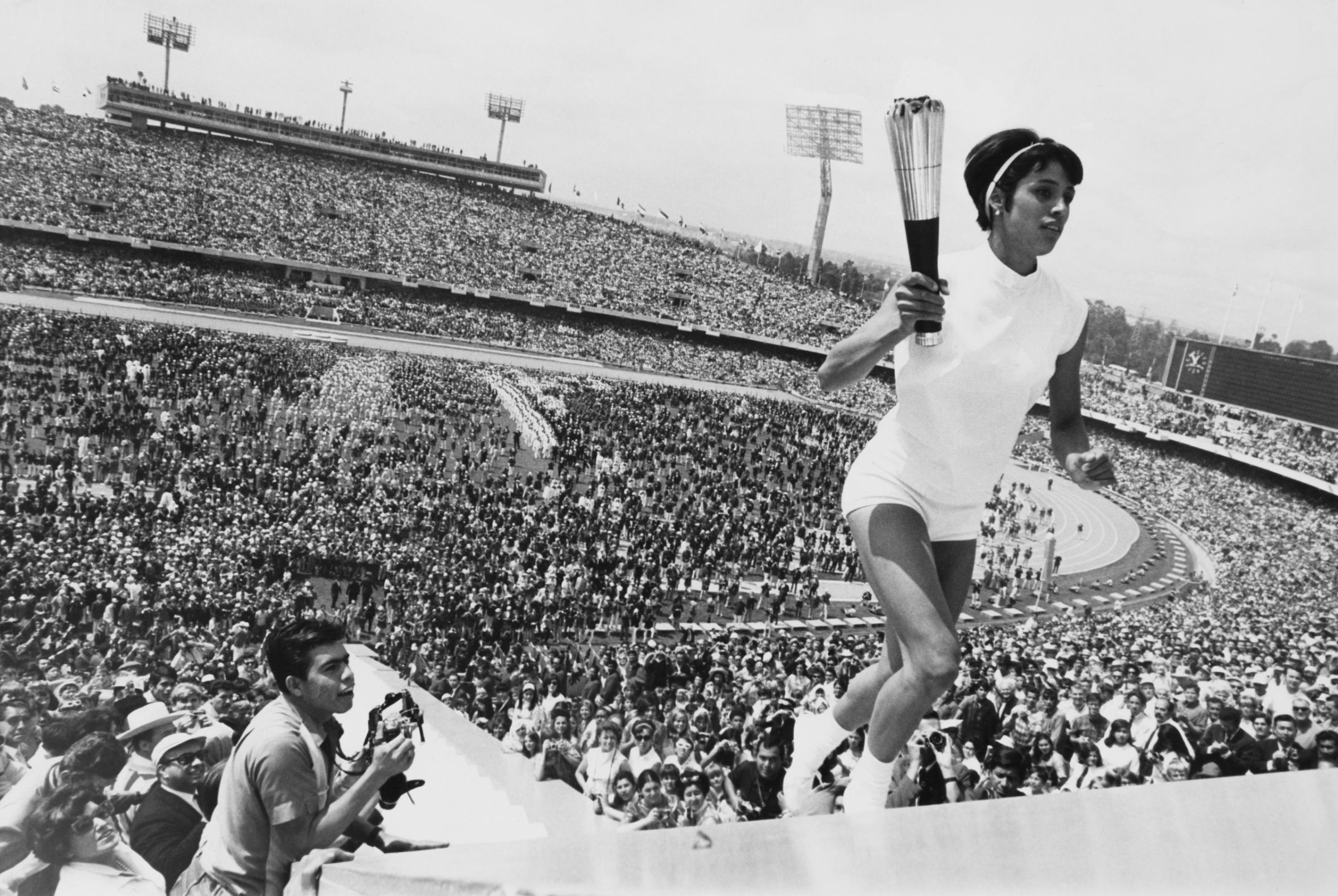 Lighting The Olympic Flame 1968, by Enriqueta Basilio