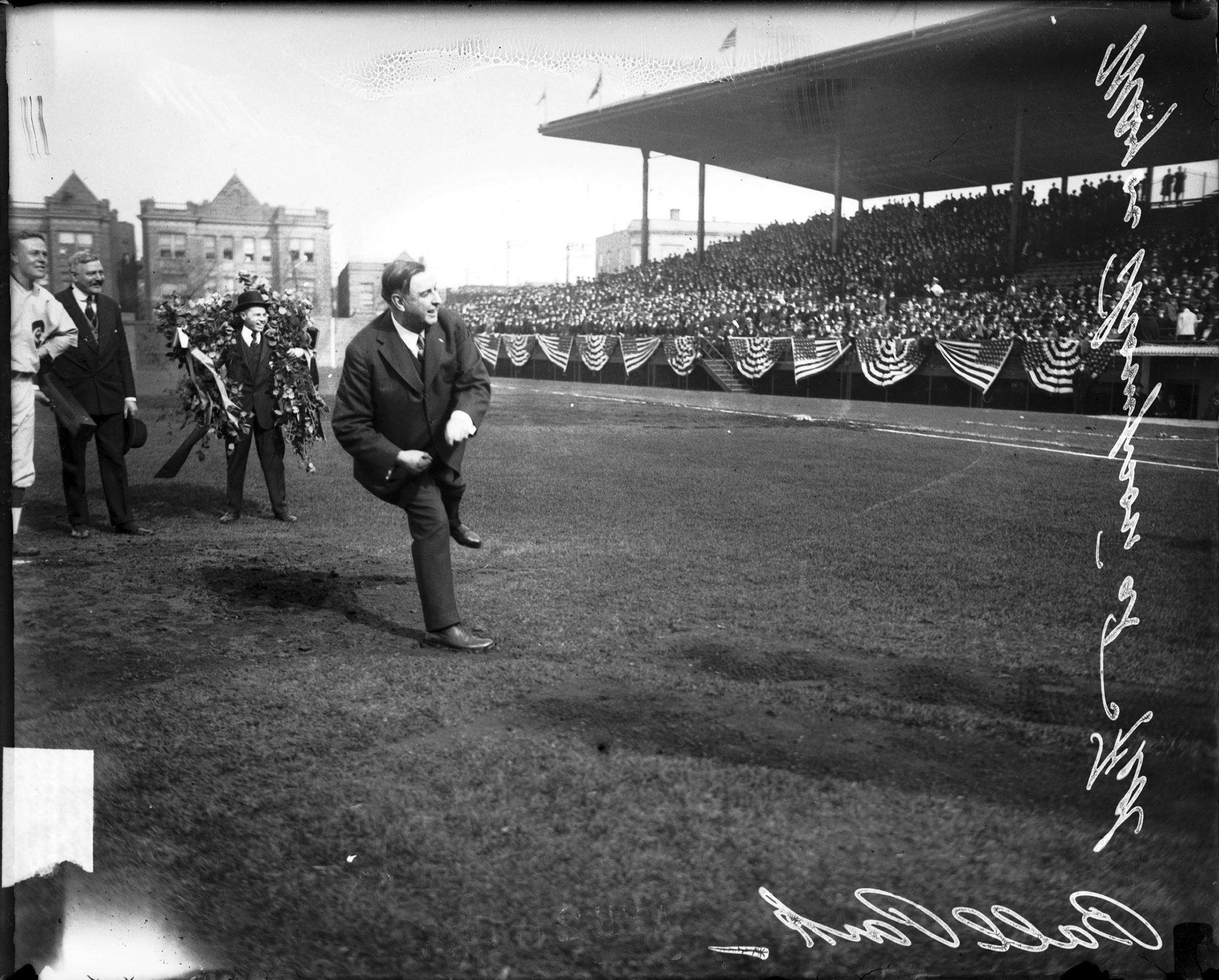 Chicago Mayor William Hale Thompson throwing first pitch at a Chicago Whales baseball game at Weeghman Park, Chicago, Illinois, 1915.
