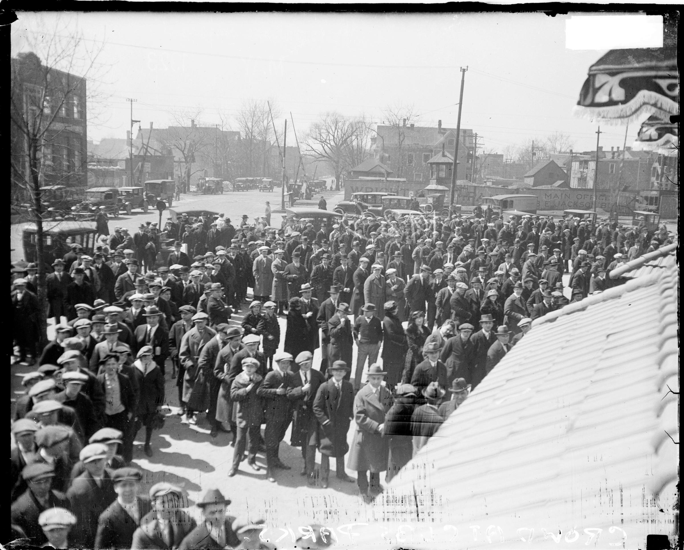Crowds waiting in lines outside Weeghman Park, Chicago, Illinois, 1923. Weeghman Park was renamed Wrigley FIeld in 1927. From the Chicago Daily News collection.