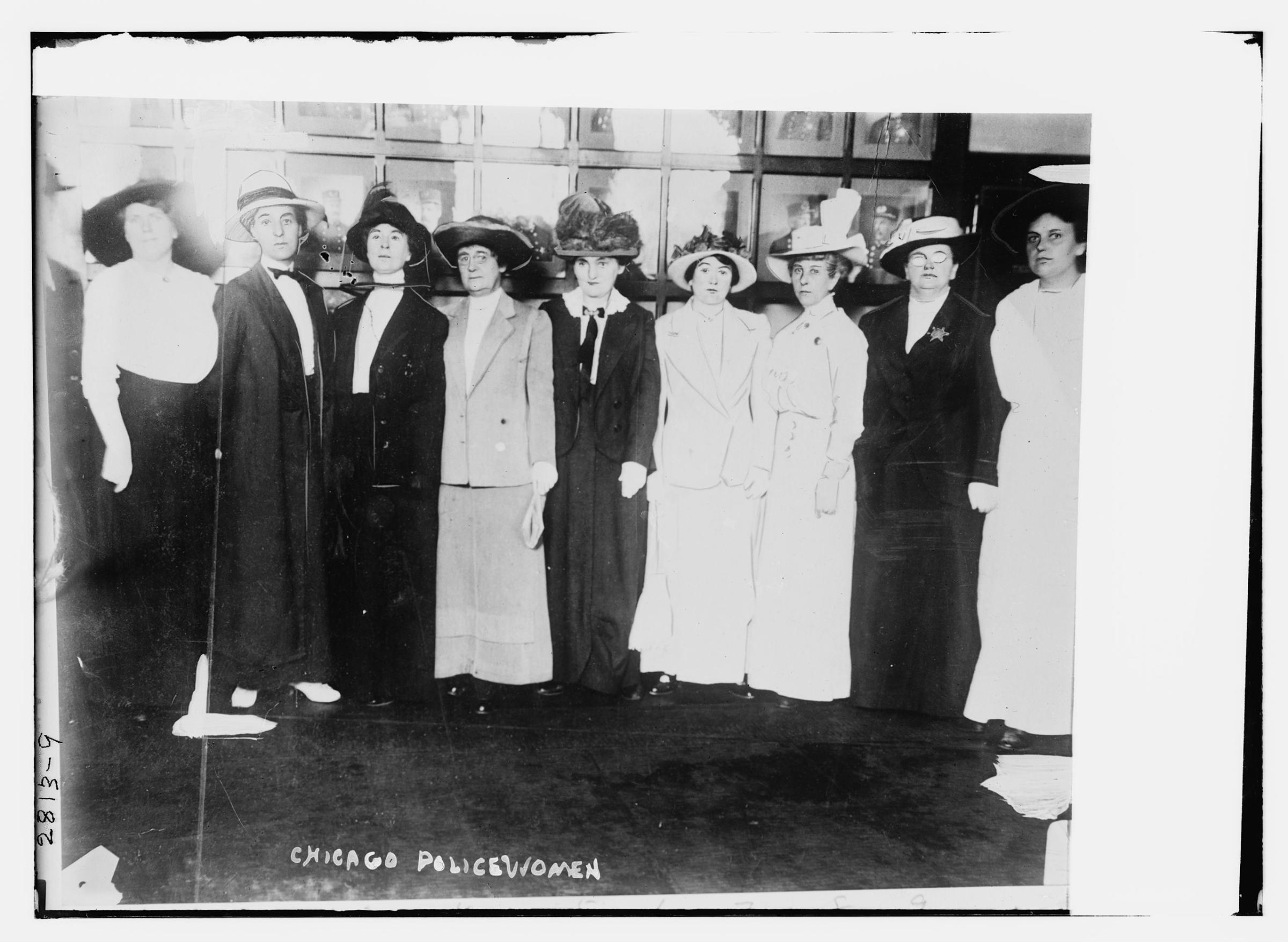 Ten women joined the Chicago police department in 1913. They are (left to right) Mrs. Anna Loucks, Miss Clara Olsen, Miss Fannie Willsey, Miss Margaret Wilson, Mrs. L. C. Parks, Mrs. Margaret Butler, Mrs. Alice Clement, Mrs. Emma F. Neukon, Mrs. T. D. Meder, and Gertrude Howe Britton.