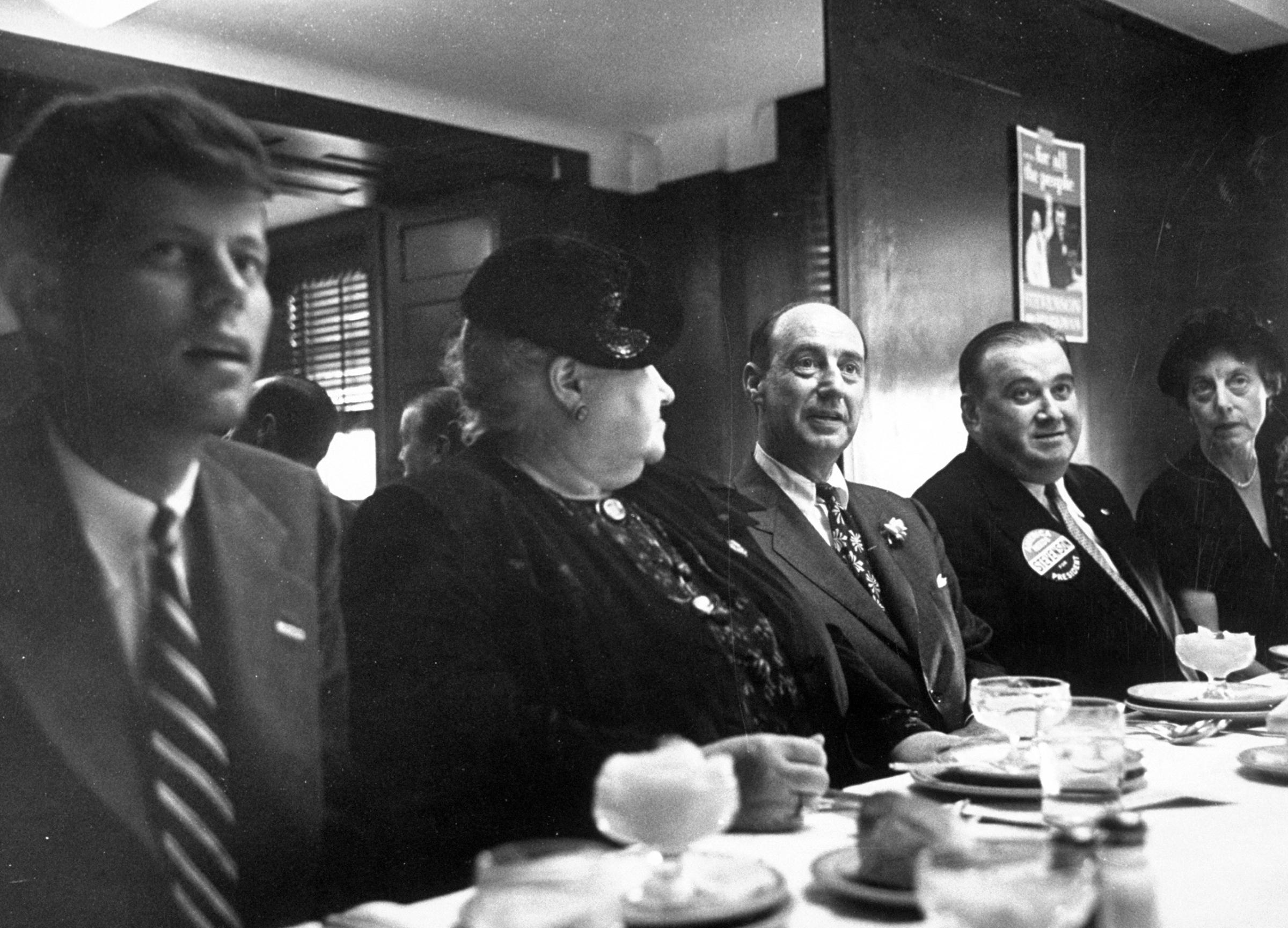 Adlai E. Stevenson (3L), Massachusetts Governor Paul Denver (4L) and John F. Kennedy (L) during their campaign trail, eating, 1952.