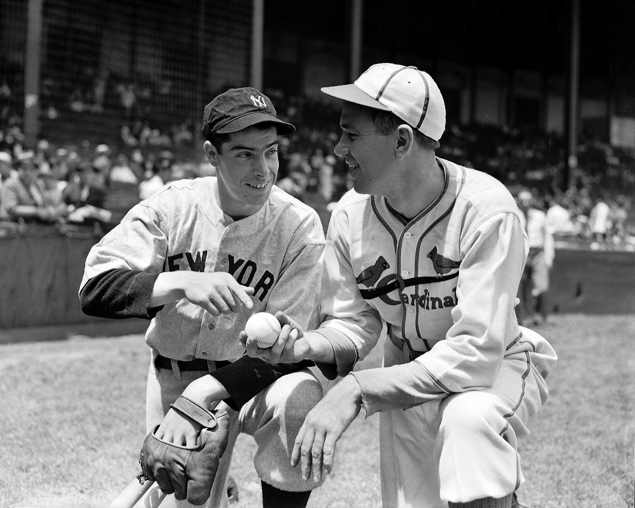 Yankees rookie Joe DiMaggio meets with Cardinals pitcher Dizzy Dean at the All-Star Game in Boston July 7, 1936.