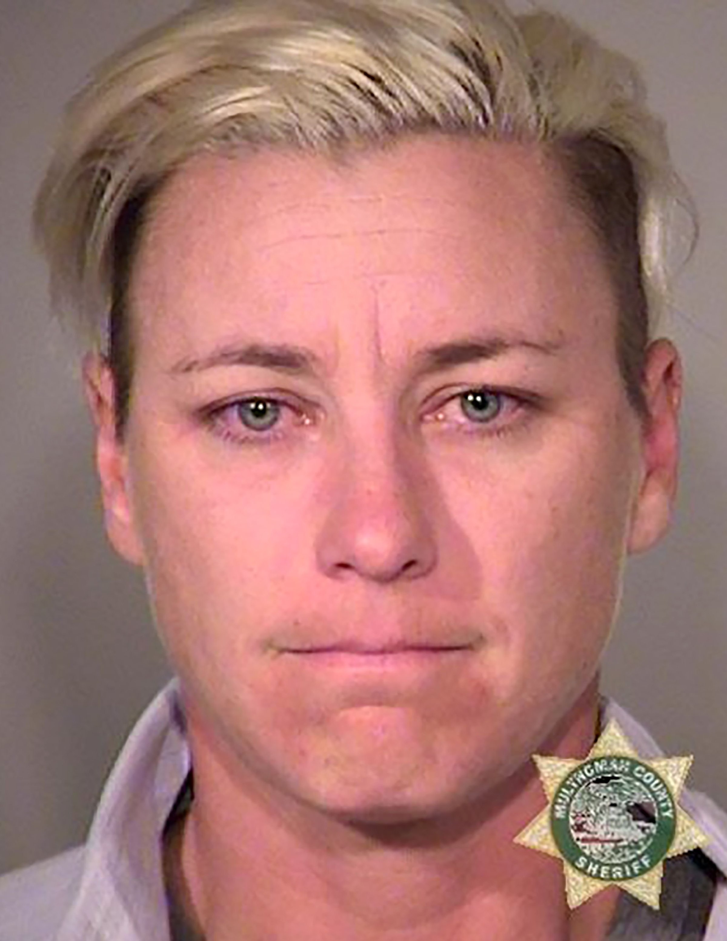 This April 3, 2016 booking photo released by the in Portland, Oregon shows American soccer star Abby Wambach.
