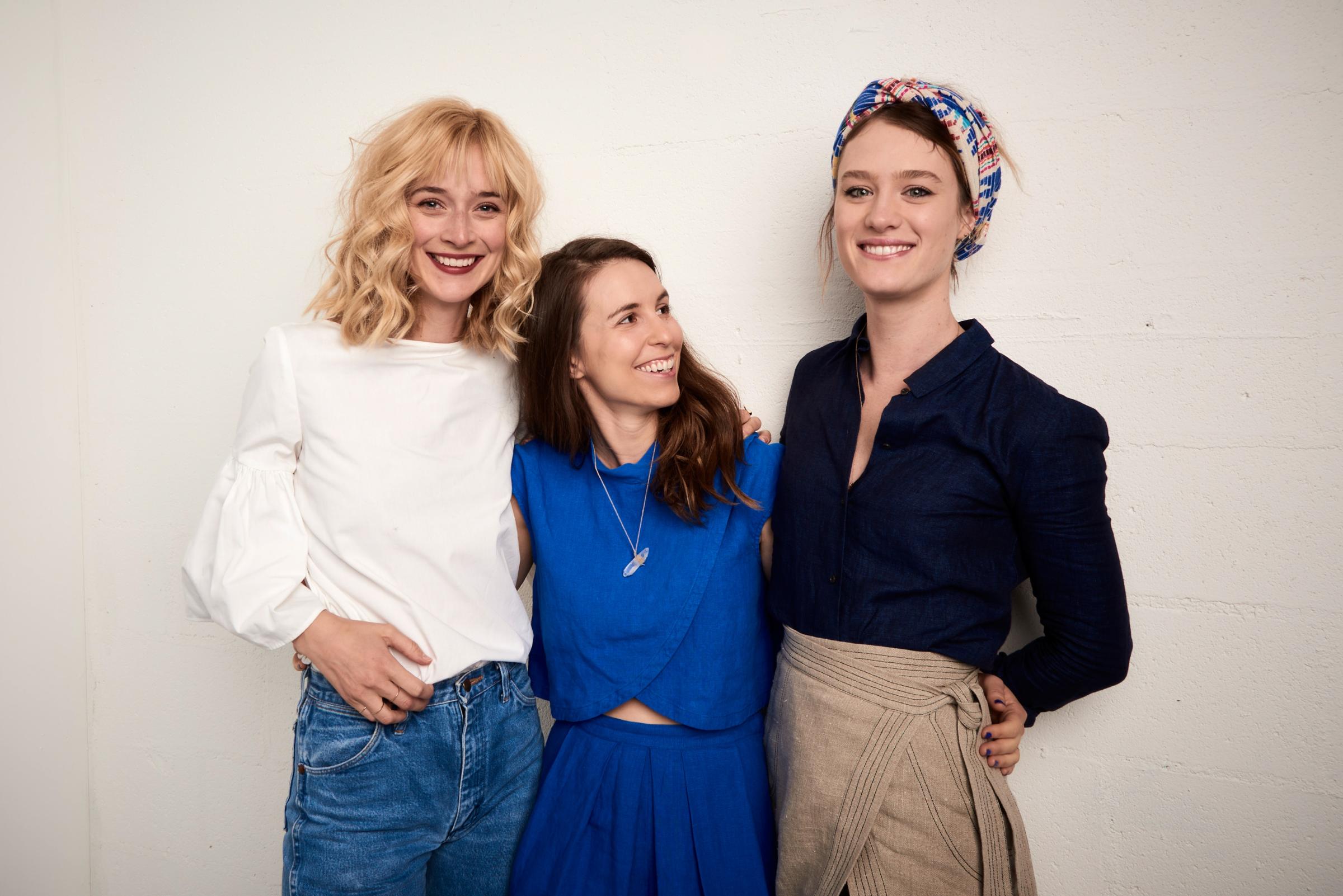 Actress Caitlin FitzGerald, director Sophia Takal, and actress Mackenzie Davis pose at the Tribeca Film Festival Getty Images Studio on April 15, 2016 in New York City.